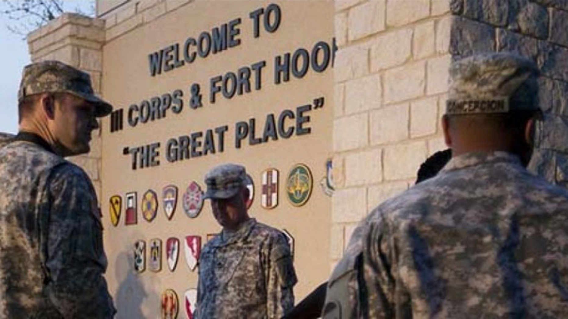Soldiers outside the gate at Fort Hood, Texas. (AP)