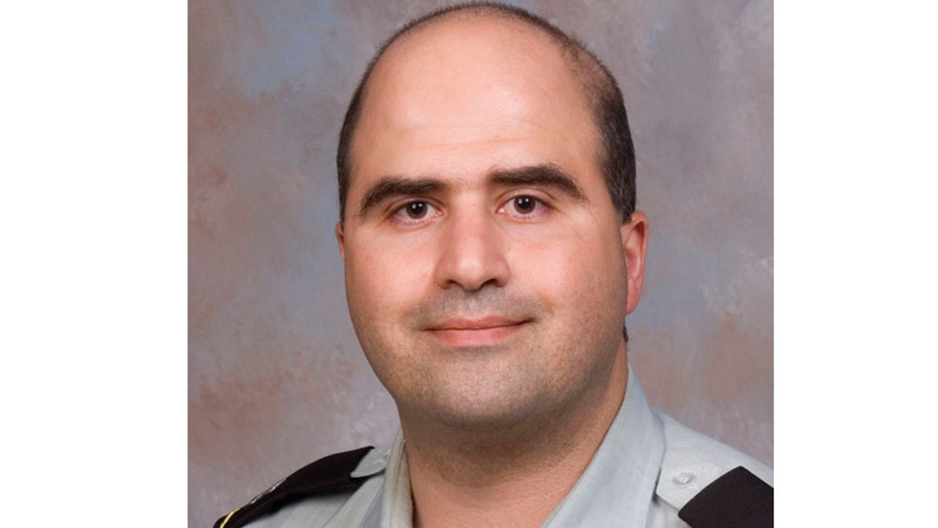 2007 File: Nidal Malik Hasan when he undertook the Disaster and Military Psychiatry Fellowship program. Hasan is charged in the fatal 2009 shooting rampage at Fort Hood.