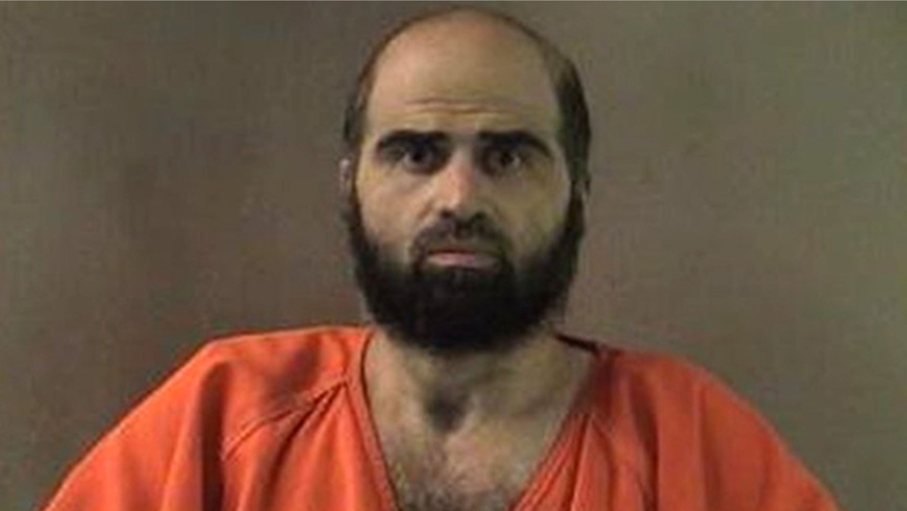This undated file photo provided by the Bell County Sheriff's Department via The Temple Daily Telegram shows Nidal Hasan, the Army psychiatrist charged in the deadly 2009 Fort Hood shooting rampage.