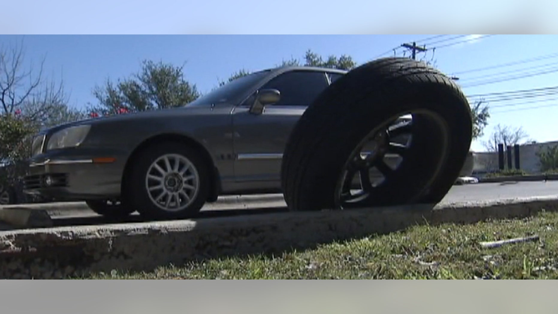 Christopher Brown's car was mistakenly spiked by police trying to stop a vehicle involved in a high-speed chase.
