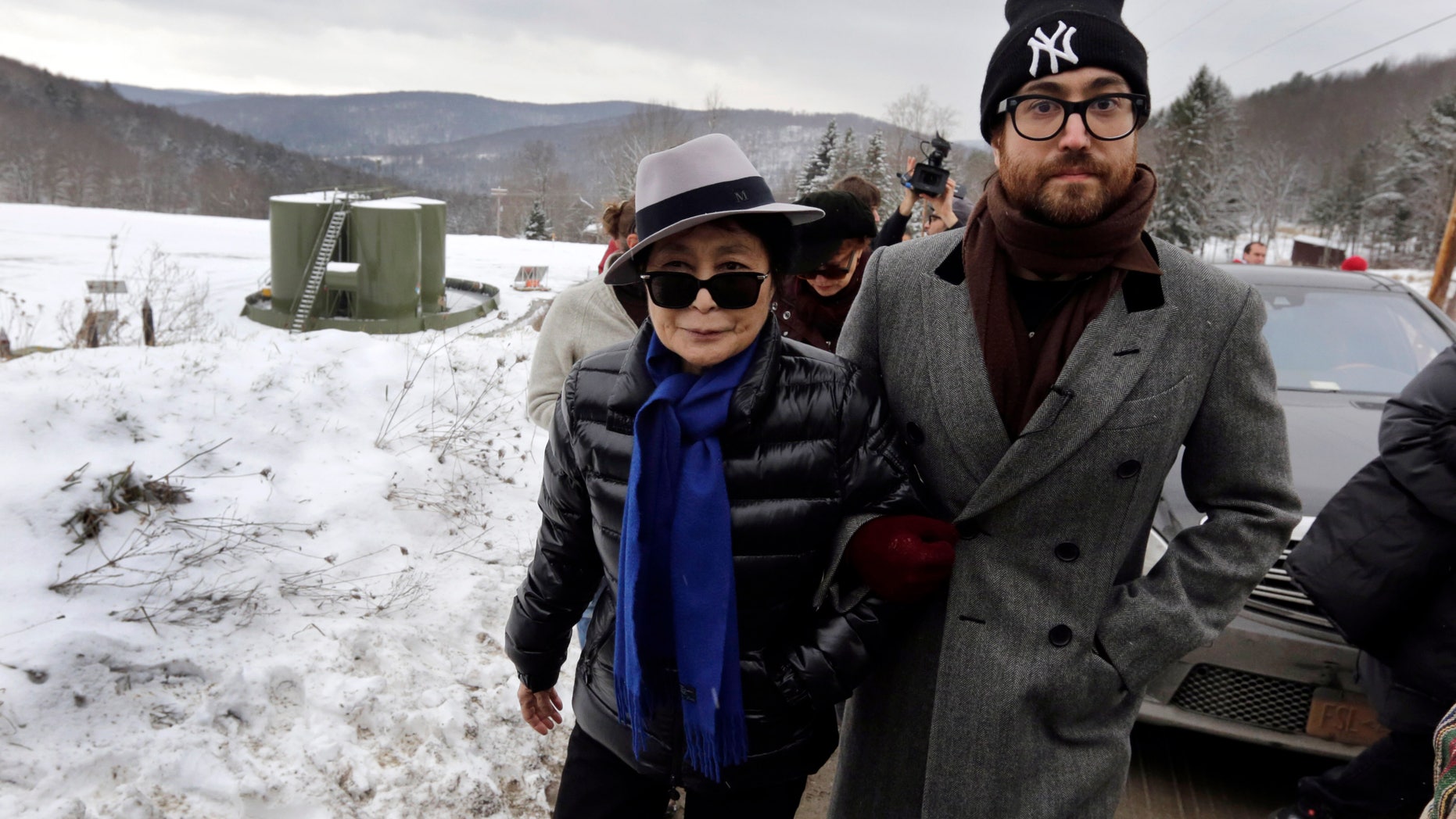 FILE: Jan. 17, 2013, Yoko Ono, left, and son Sean Lennon visit a fracking site in Franklin Forks, Pa., during a bus tour of natural-gas drilling sites in northeastern Pennsylvania.