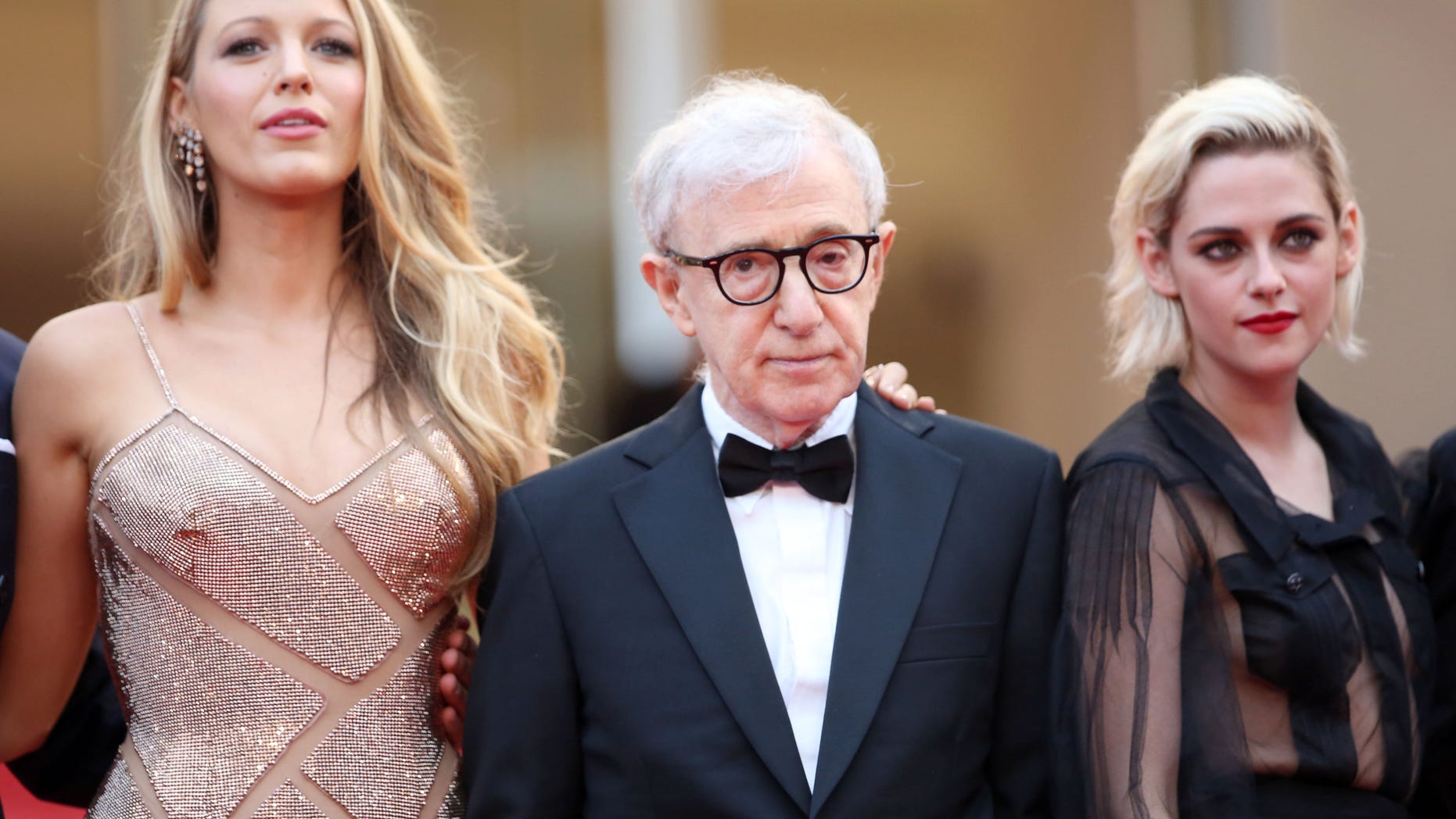 Actress Blake Lively, left, director Woody Allen and actress Kristen Stewart arrive on the red carpet for the screening of the film Cafe Society and the Opening Ceremony at the 69th international film festival, Cannes, southern France, Wednesday, May 11, 2016.