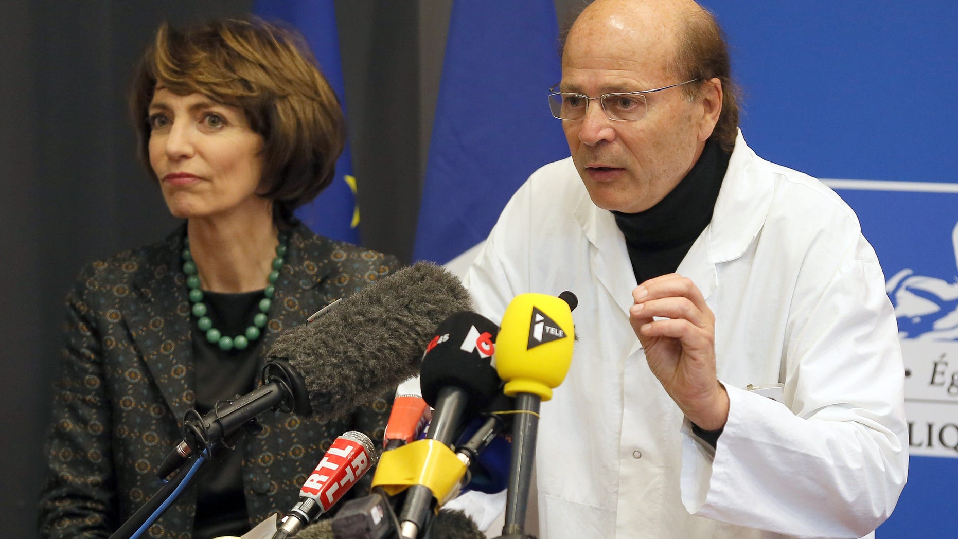French Health Minister Marisol Touraine, left, and Professor Gilles Edan, the chief neuroscientist at Rennes Hospital, address the media during a press conference.
