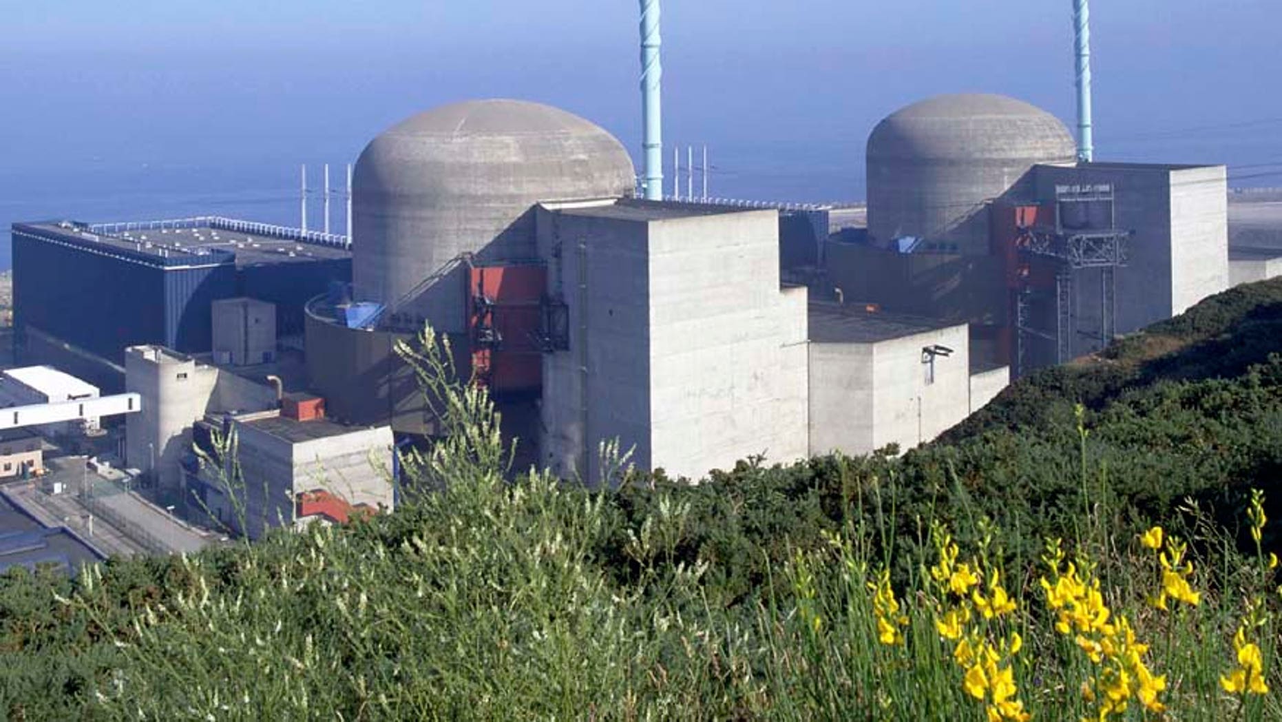 This undated photo provided by Electricite de France (EDF), France's state-run utility company, shows the current nuclear plant of Flamanville, Normandy, France. French authorities say there has been an explosion in a nuclear power plant's machine room early on Thursday, Feb. 9, 2017, but that there is no leak of radiation. No injuries have been reported. (Pierre Berenger/EDF via AP)