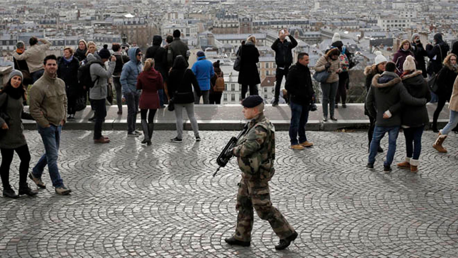 Nov. 21, 2015: A soldier patrols outside the Sacre Coeur basilica in Montmartre Paris. Security has been on high alert in the French capital, after the attacks in Paris on Nov. 13, which killed 130 people.