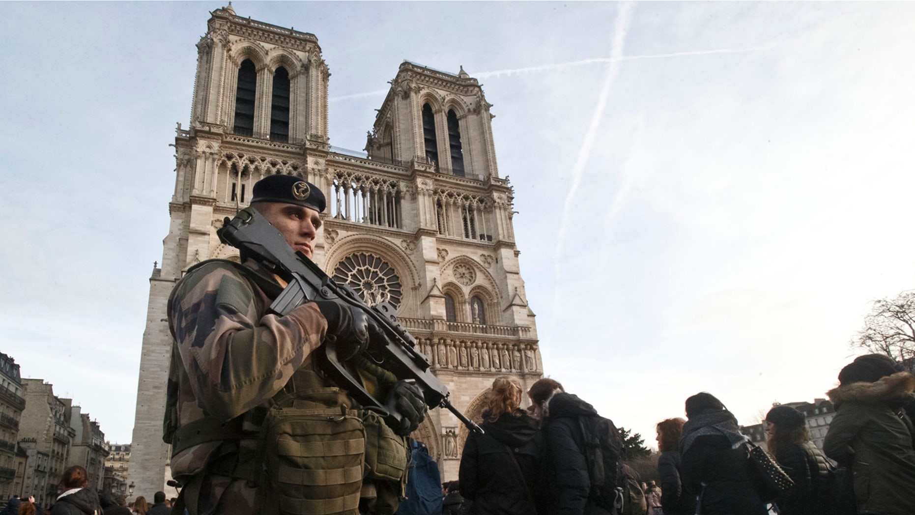 Dec. 30, 2015: A soldier patrols outside Notre Dame cathedral in Paris. (AP Photo/Michel Euler)