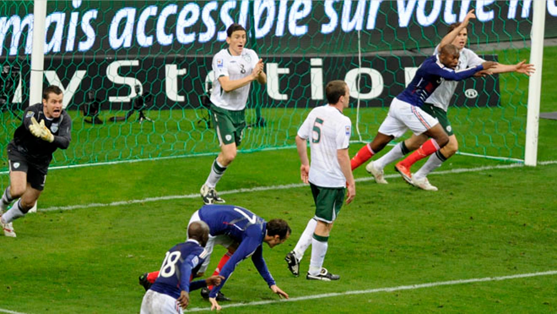Nov. 18, 2009: Ireland's goalkeeper Shay Given (L) reacts after controversial goal by France's William Gallas (2nd R) where team captain Thierry Henry touched the ball during their World Cup qualifying playoff match at the Stade de France stadium in Saint-Denis near Paris. (Reuters)