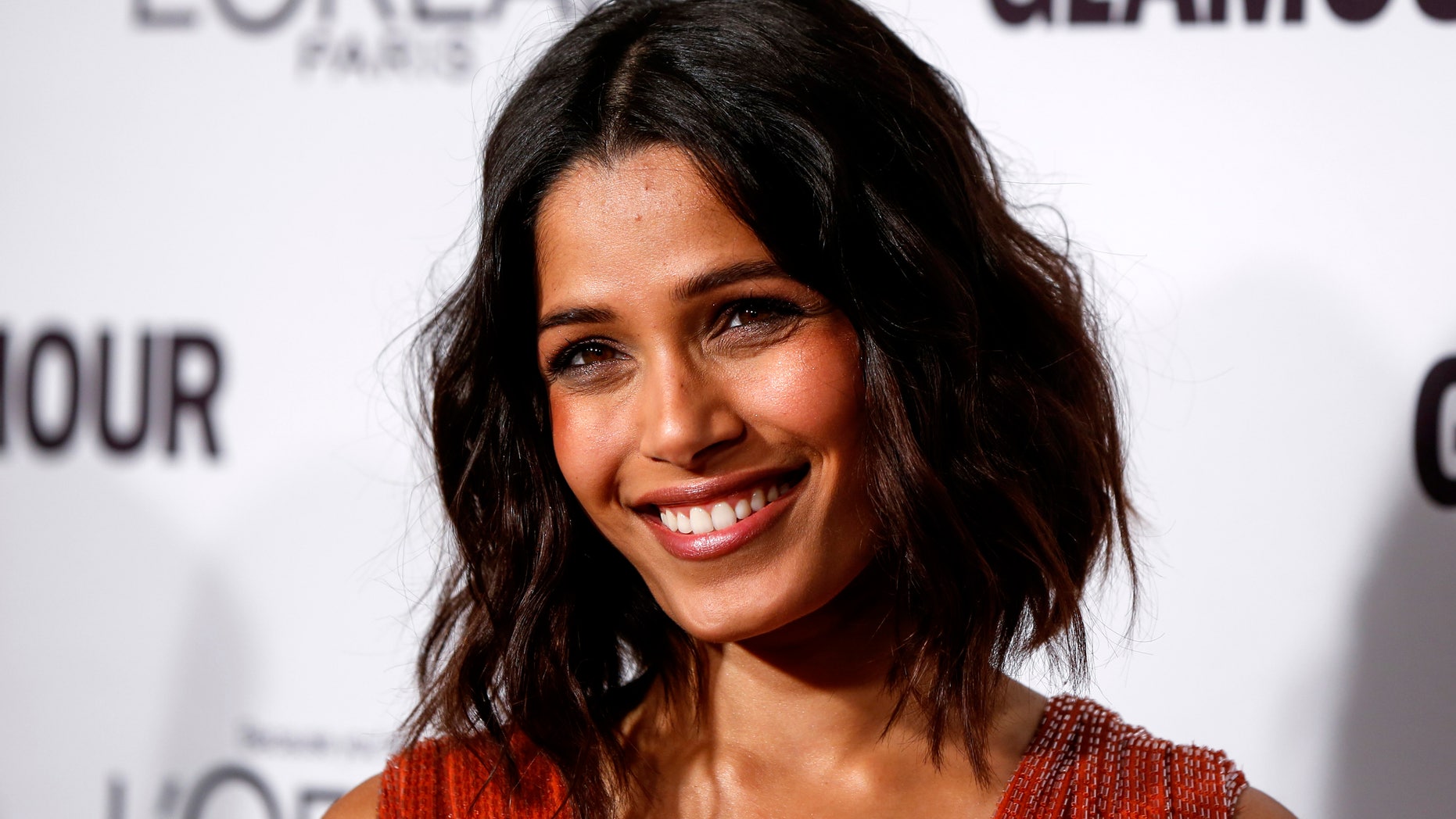 Actress Freida Pinto arrives for Glamour Magazine's annual Women of the Year award ceremony in New York November 10, 2014. REUTERS