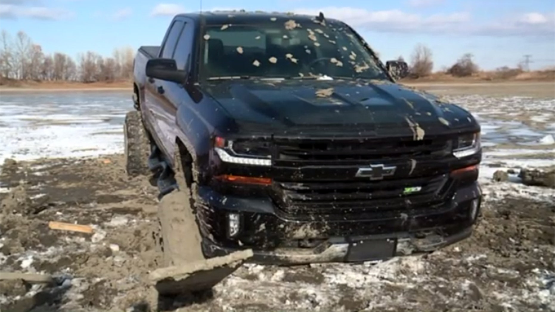 A couple of truck owners in Illinois thought they'd take their new 4x4 out for a ride on a frozen pond. Bad idea.