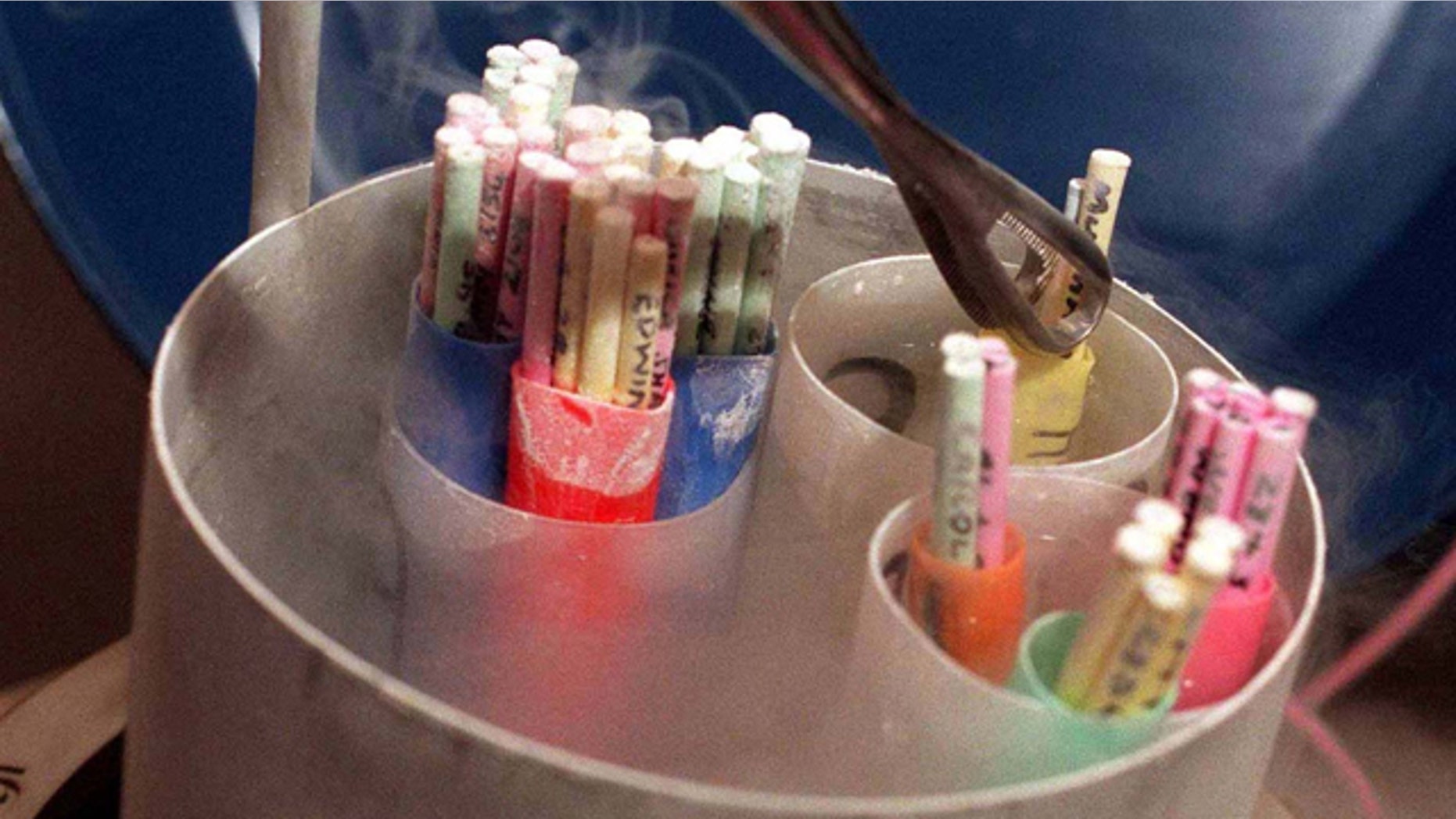 Frozen human embryos are checked at the Priory Hospital in Birmingham, England.