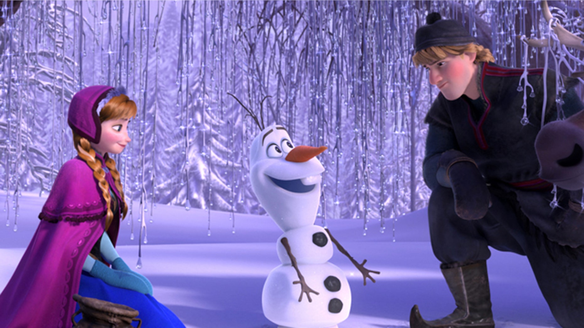 This image released by Disney shows , from left, Anna, voiced by Kristen Bell, Olaf, voiced by Josh Gad, and Kristoff, voiced by Jonathan Groff in a scene from the animated feature "Frozen."