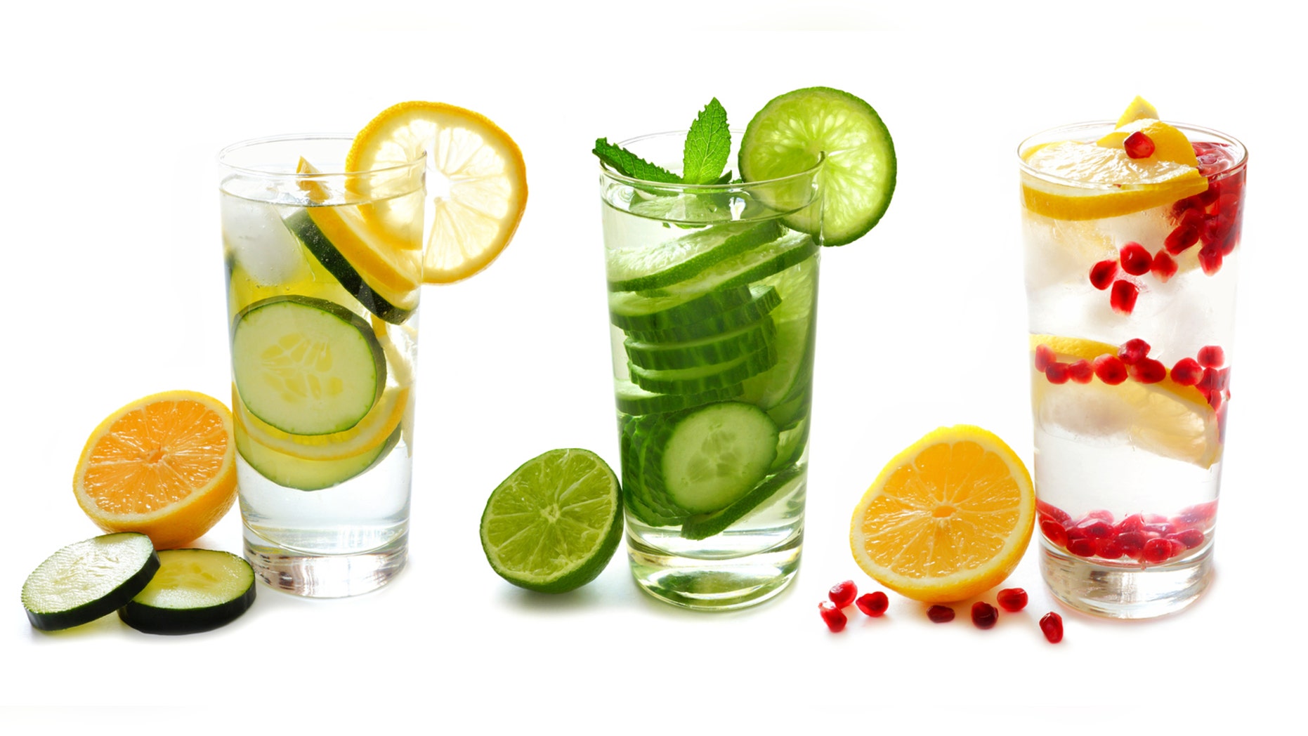 Three types of detox water with fruit in glasses isolated on a white background