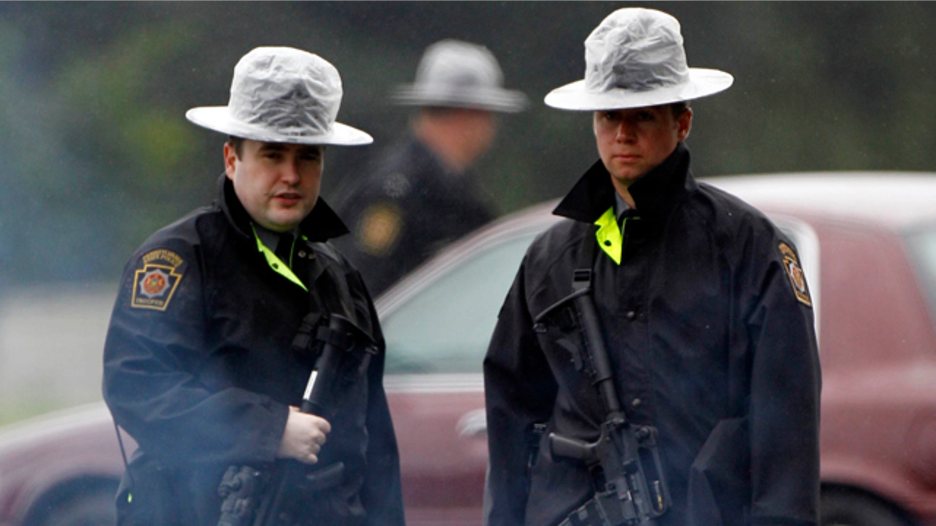August 28, 2011: Pennsylvania State Police troopers man a roadblock in Furlong, Pa. (AP)