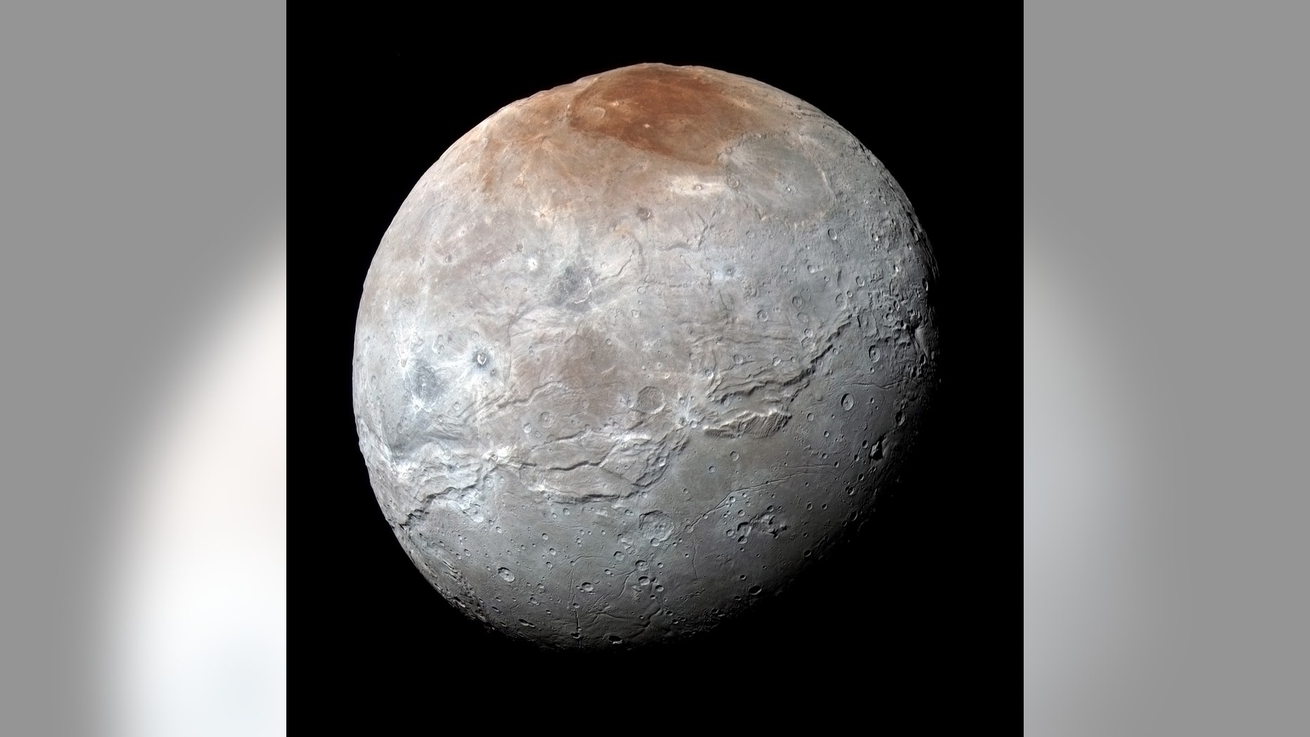 NASA's New Horizons spacecraft captured this high-resolution, enhanced color view of Pluto’s largest moon, Charon, just before closest approach on July 14, 2015.