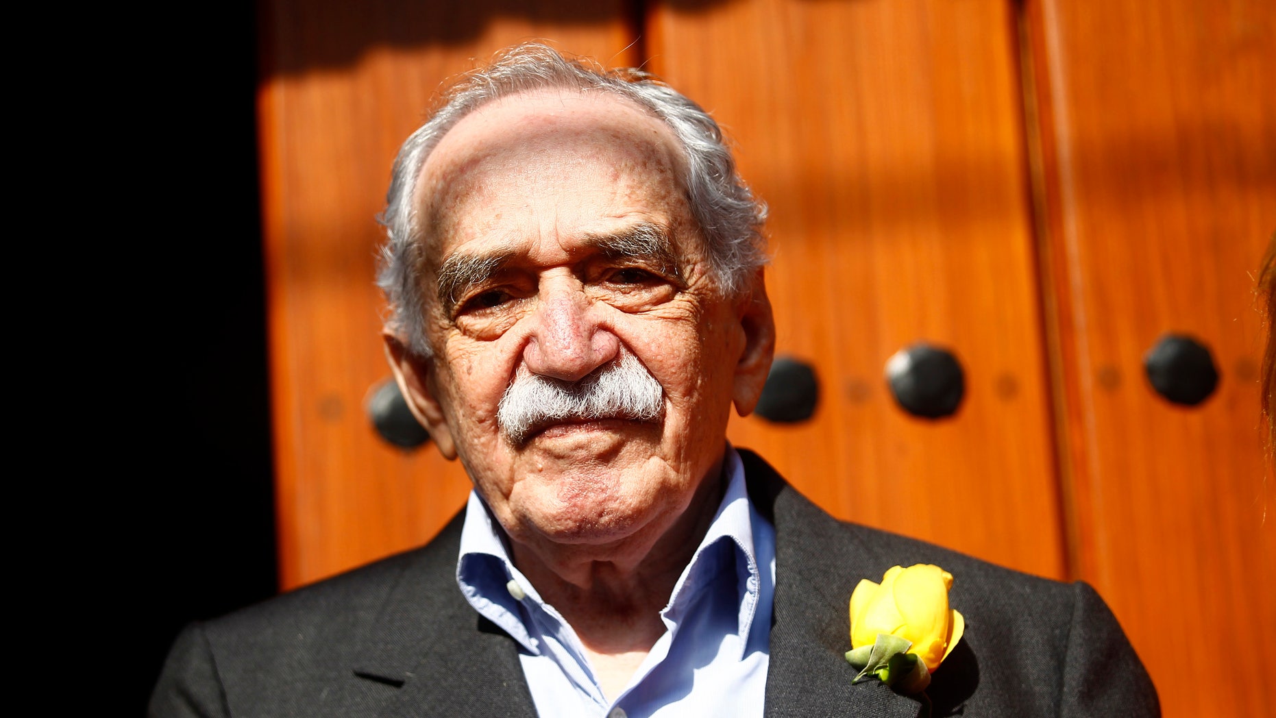 March 6, 2014. Colombian author Gabriel Garcia Marquez stands outside his house on his 87th birthday in Mexico City.