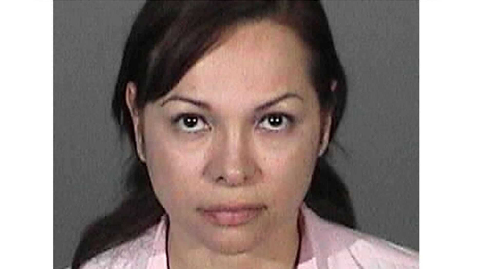 In this police booking photo released on Feb.23,2012 by the Montebello Police Department showing a Los Angeles Unified high school teacher Gabriela Cortez, 42, of Montebello, Calif. who was arrested after two male students said they had sex with her. (AP Photo/ Montebello Police Department)