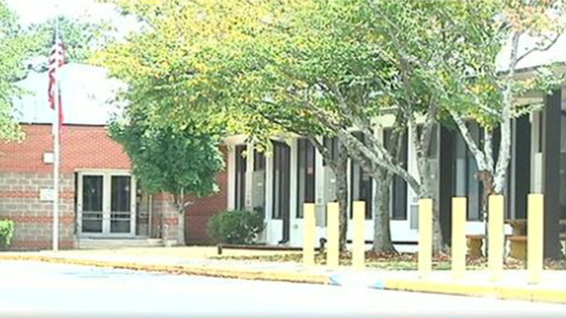 A dad is suing after he was not allowed to bring his gun to Georgia's Beulah Elementary School, pictured.