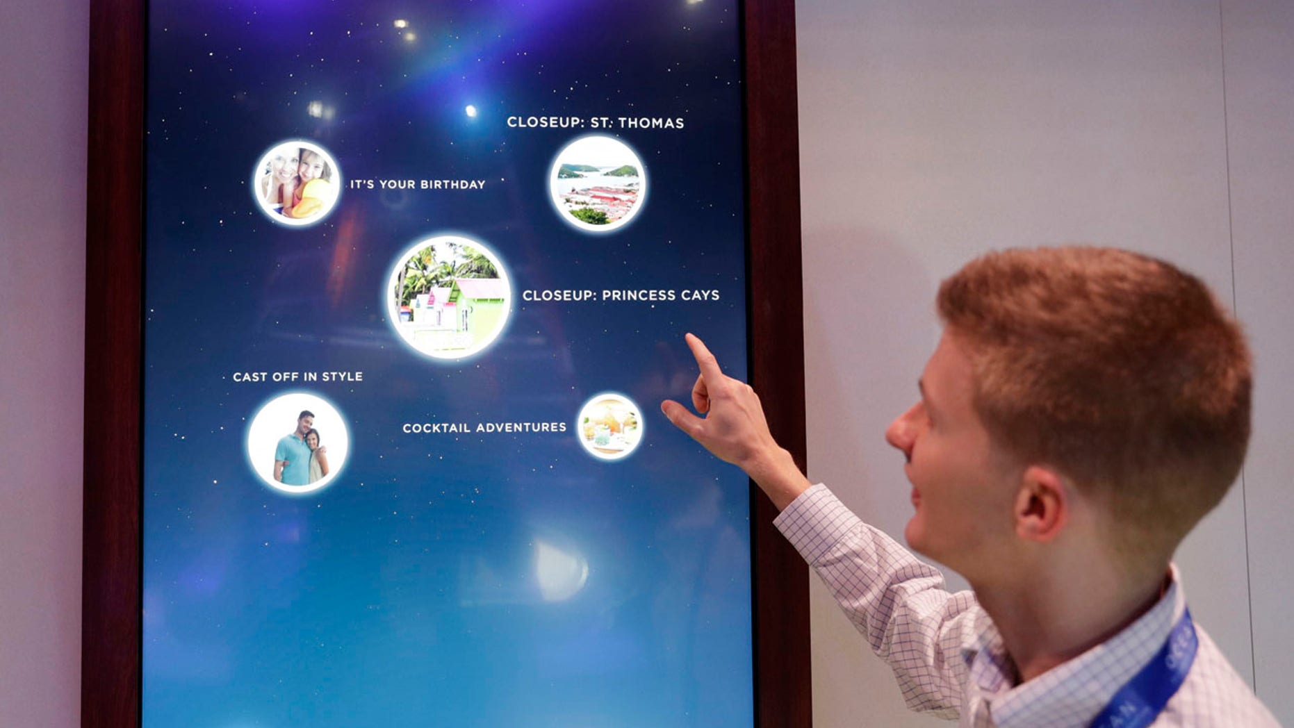 Miles Clark of Carnival Corp. demonstrates the Ocean Compass interface before CES International, Tuesday, Jan. 3, 2017, in Las Vegas.