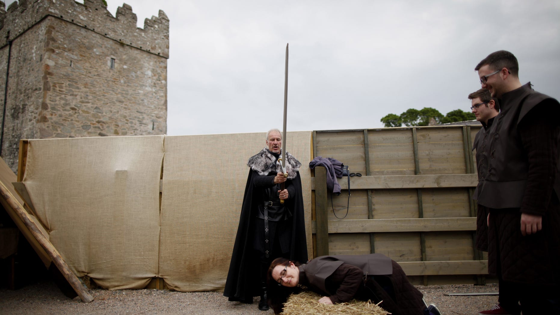 June 13, 2014. William Van der kells from Clearsky Adventure entertains Game of Thrones tourists at an exact replica of Winterfell Archery range in the same spot where filming took place for the Game of Thrones at castleward, Strangford, Northern Ireland.