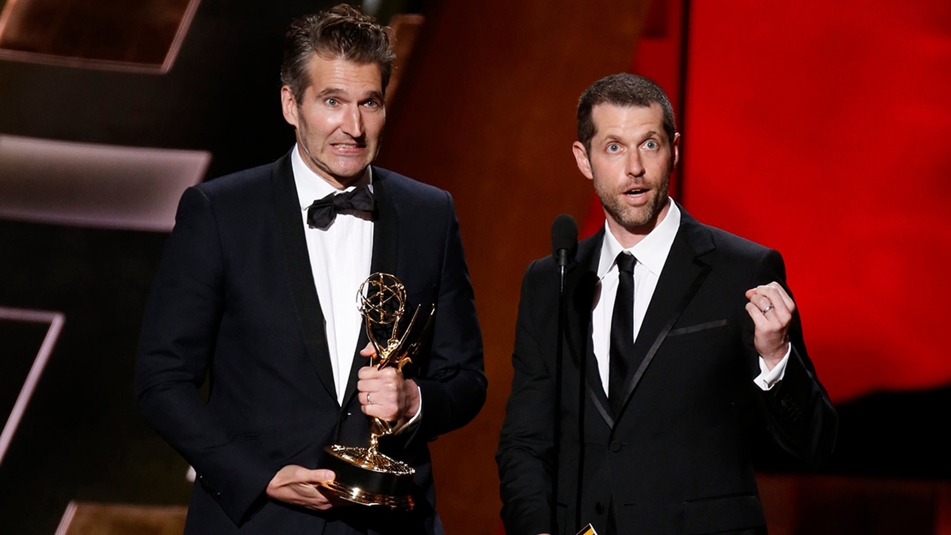 David Benioff (L) and D.B. Weiss accept the award for Outstanding Writing For A Drama Series for HBO's "Game of Thrones" at the 67th Primetime Emmy Awards in Los Angeles, California September 20, 2015. REUTERS/Lucy Nicholson - TB3EB9L06GQU7