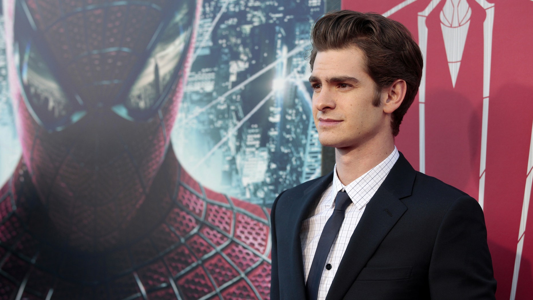July 3, 2012. Andrew Garfield poses at the premiere of "The Amazing Spider-Man" at the Regency Village theatre in Los Angeles, California.
