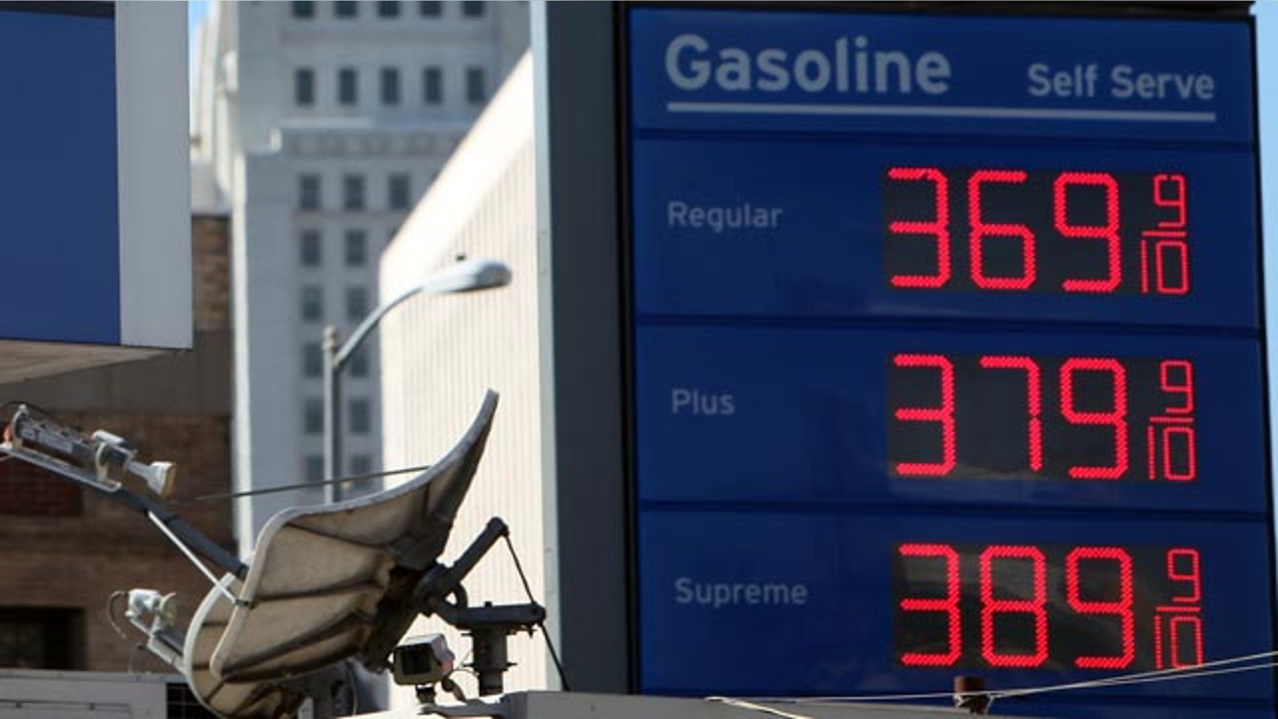 Wholesale gas prices rose in October for the fourth straight month. Shown here are high gasoline prices at a Chevron gas station in Los Angeles.