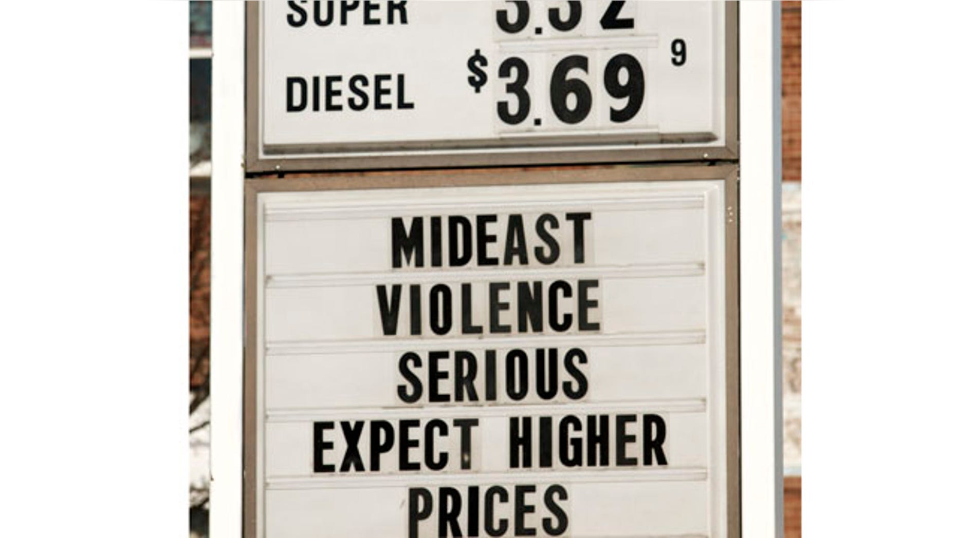 Feb. 23: A sign advertises gas and diesel prices while also giving an explanation to customers at a service station in Easthampton, Mass.