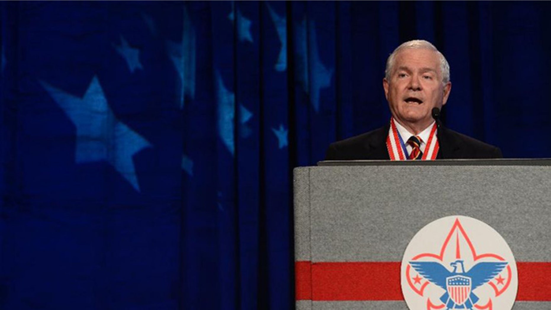 In this Friday, May 23, 2014 file photo, former Defense Secretary Robert Gates addresses the Boy Scouts of America's annual meeting in Nashville, Tenn., after being selected as the organization's new president.