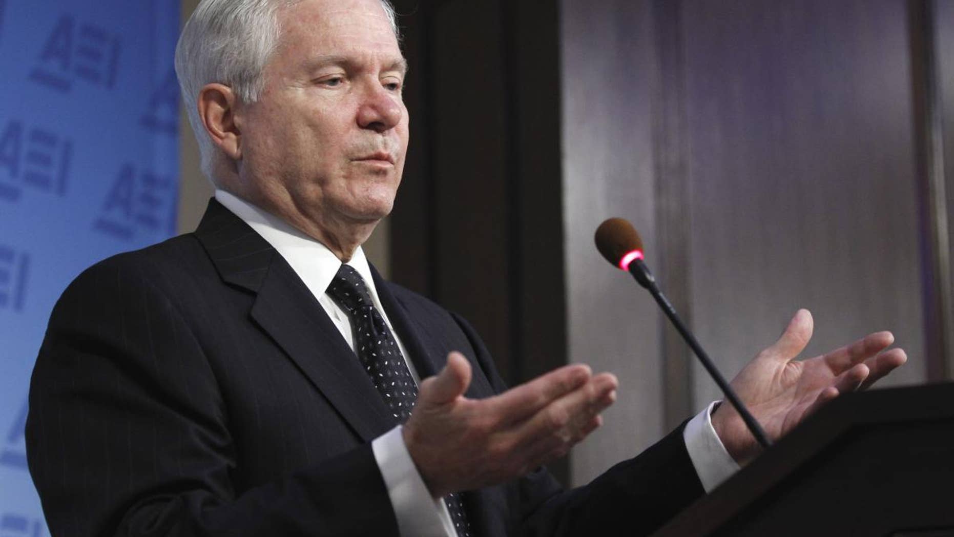 Defense Secretary Robert Gates gestures while speaking at the American Enterprise Institute for Public Policy Research in Washington, Tuesday, May 24, 2011. (AP Photo/Alex Brandon)