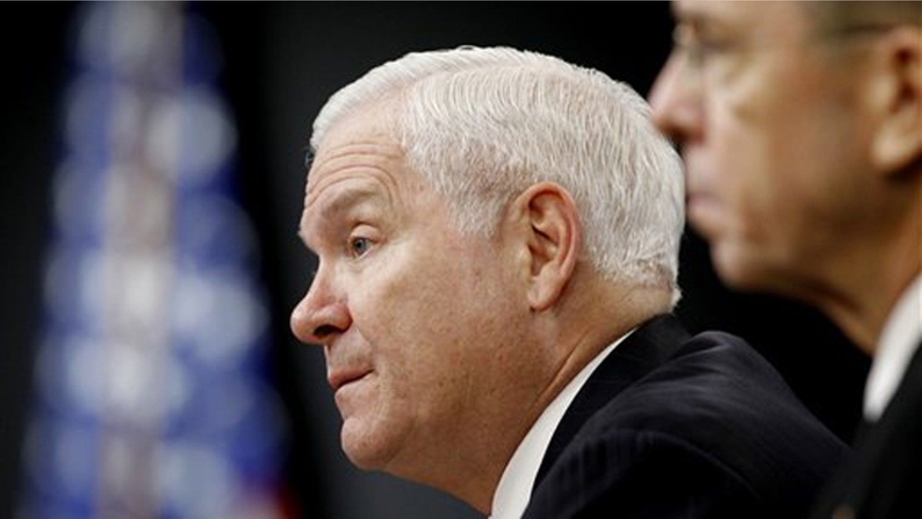 Defense Secretary Robert Gates, left, and Joint Chiefs Chairman Adm. Mike Mullen talk to the media about defense budget cuts Jan. 6 at the Pentagon.