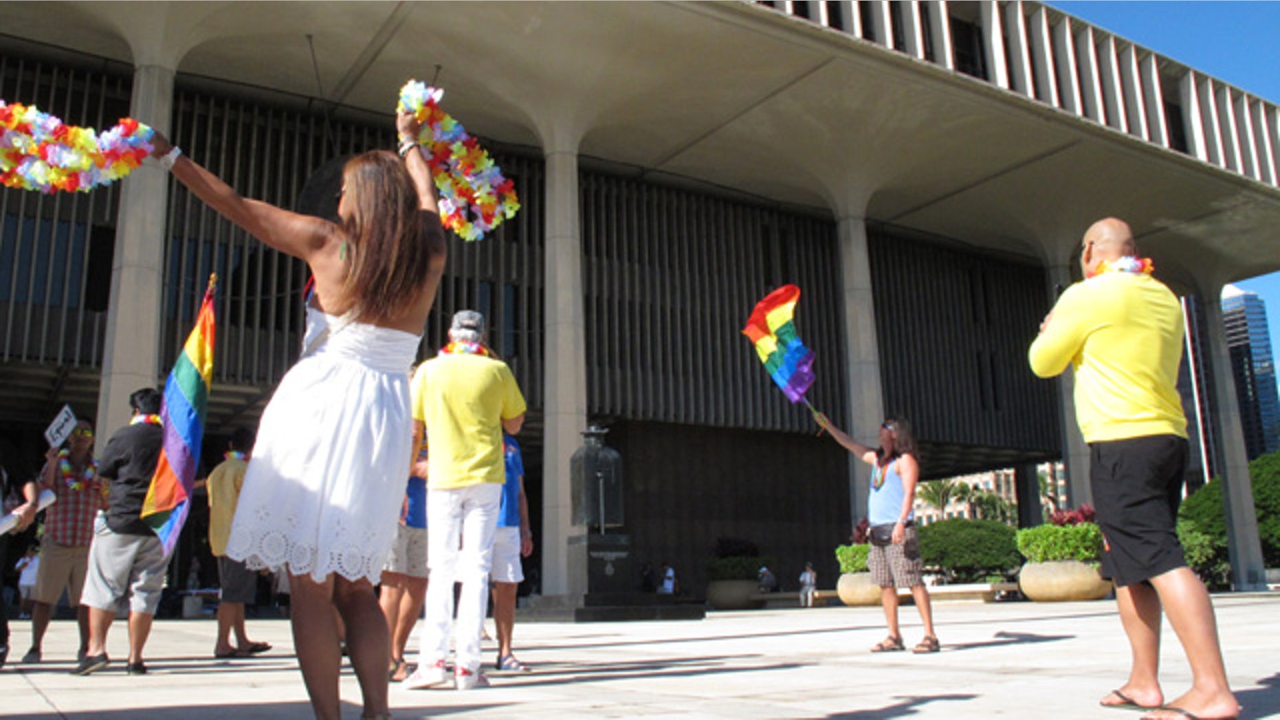 Nov. 12, 2013: Gay marriage supporters rally outside the Hawaii Capitol in Honolulu ahead of a Senate vote on whether to legalize same-sex marriage.