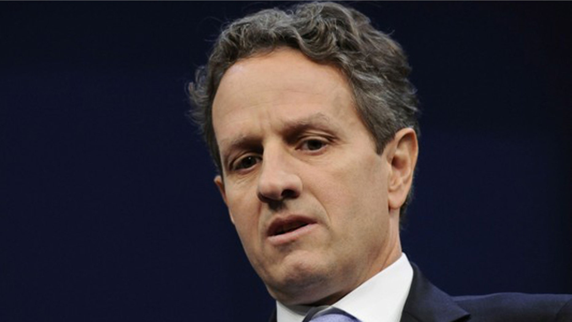Treasury Secretary Timothy Geithner sits onstage for an interview at the Newseum in Washington May 25.