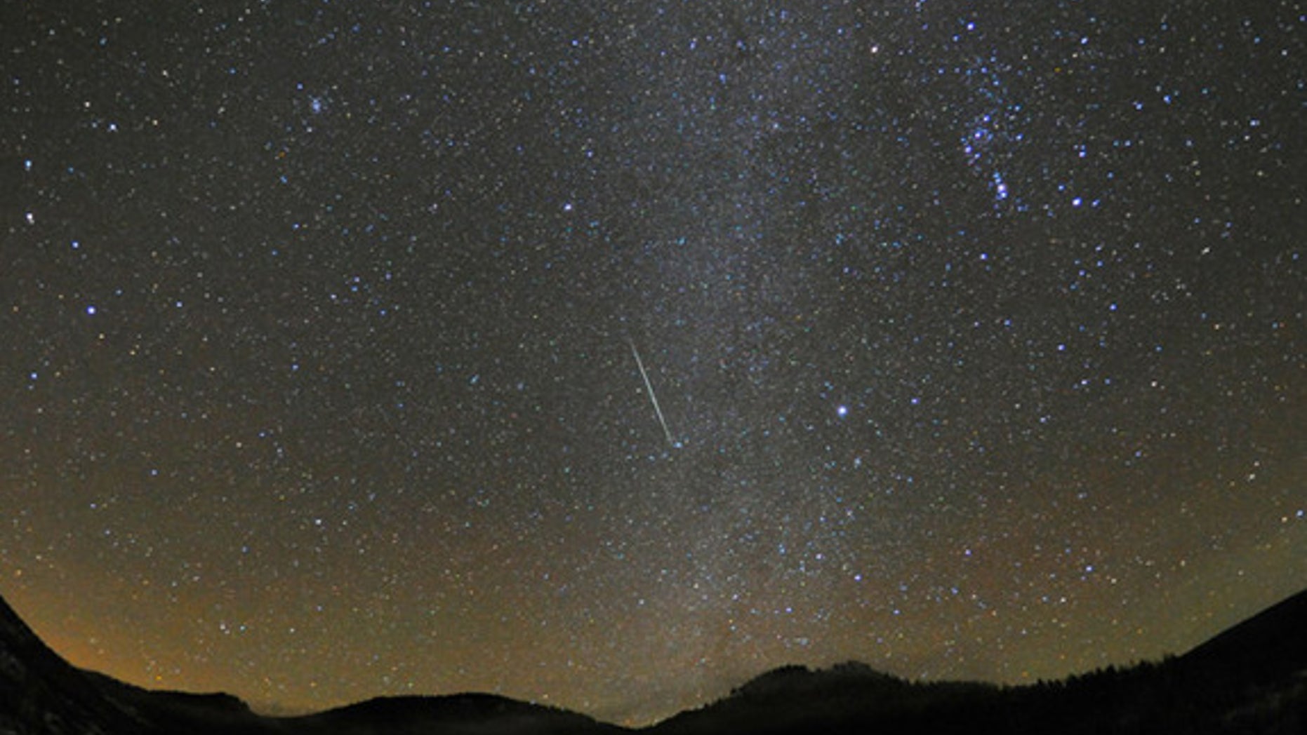 A Geminid meteor streaks across the sky over Steamboat Springs, Colo., on Dec. 12, 2010.