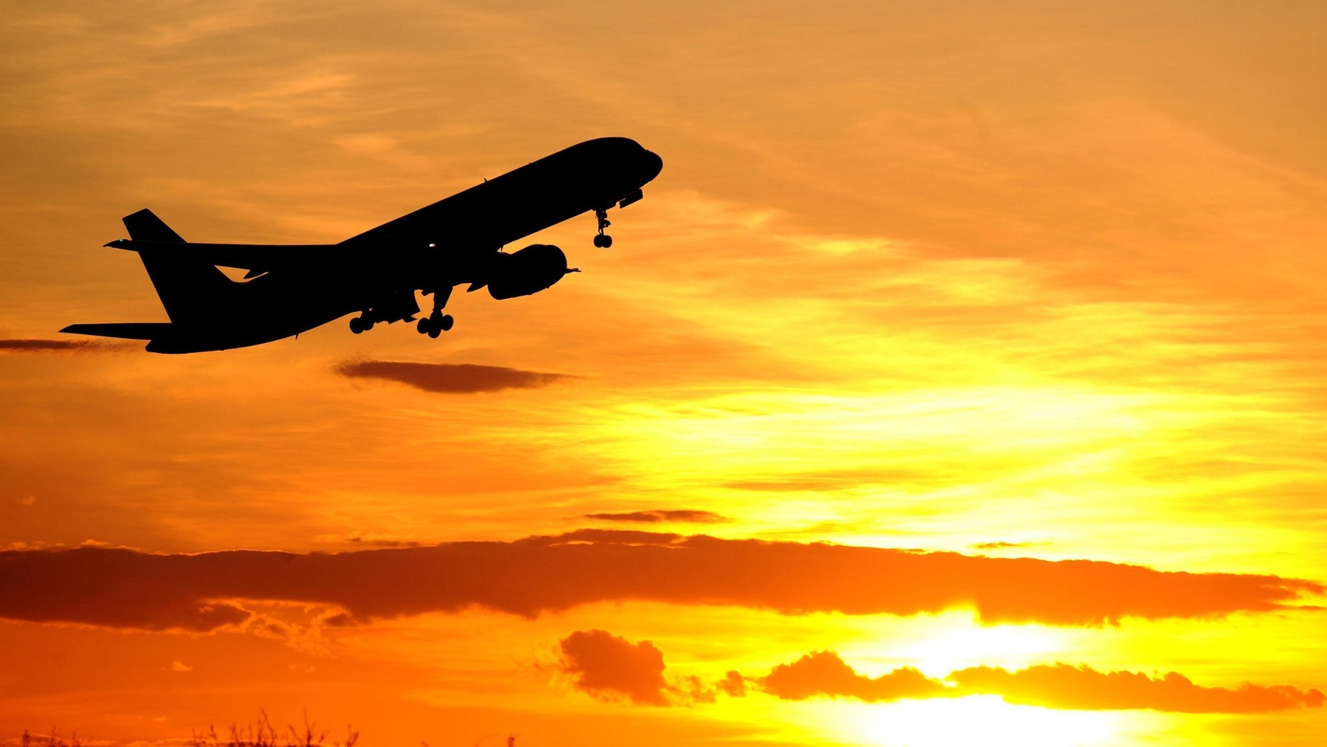 FILE -- March 24, 2013: A plane leaves Newcastle Airport.
