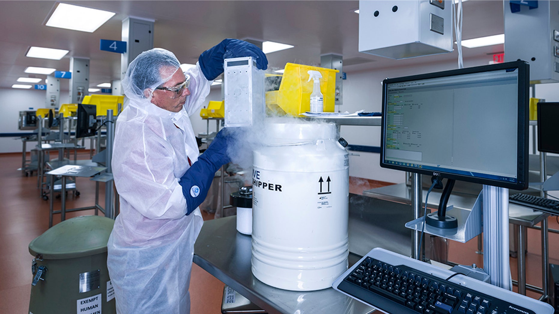 In this July 9, 2015, photo, provided by Novartis Pharmaceuticals Corp., human T cells belonging to cancer patients arrive at Novartis Pharmaceuticals Corp.'s Morris Plains, N.J., facility. This laboratory is where the T cells of cancer patients are processed and turned into super cells as part of a new gene therapy-based cancer treatment Novartis is a part of. (Brent Stirton/Courtesy of Novartis Pharmaceuticals Corp. via AP)