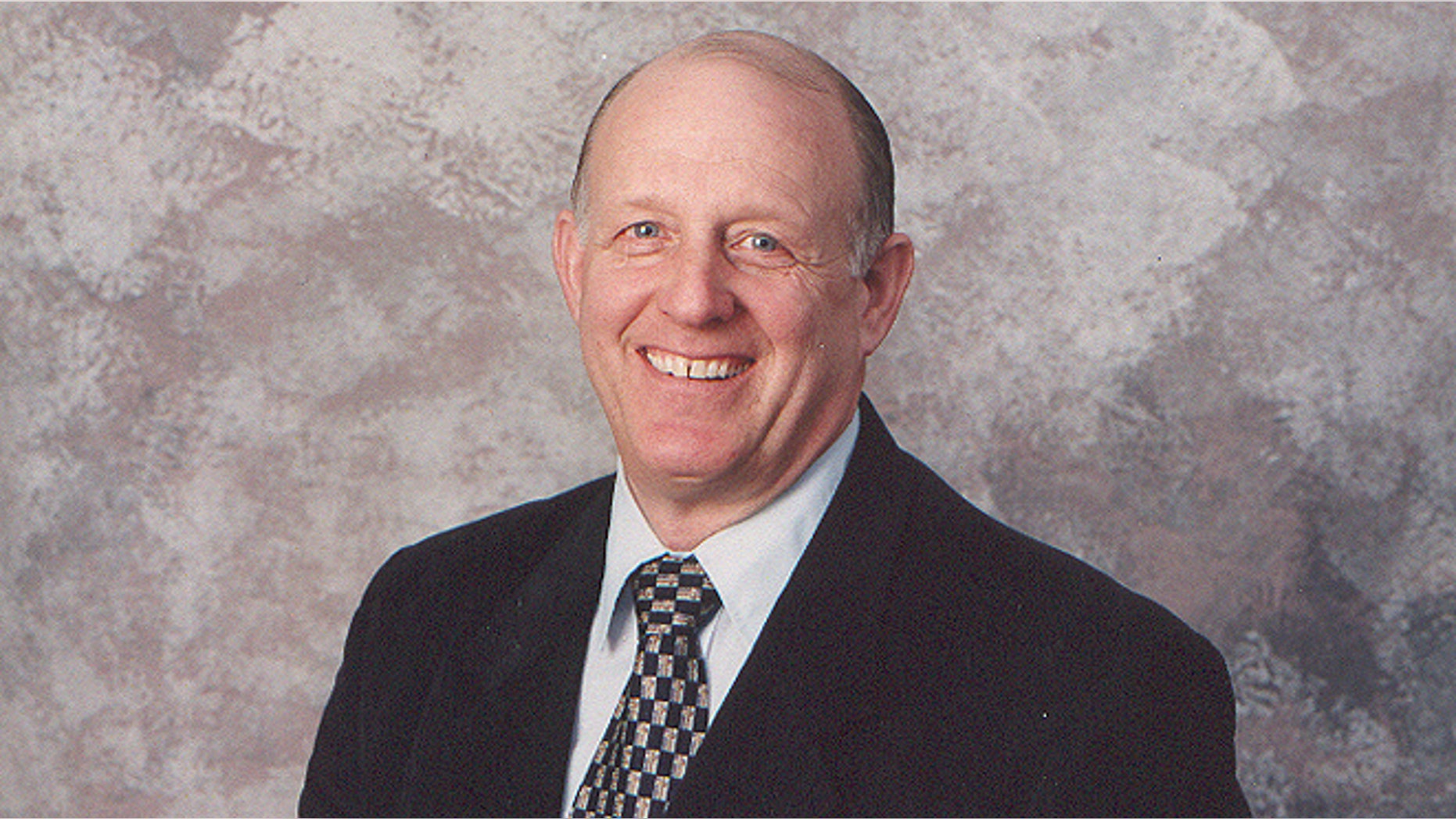 Robert Genevicz, 67, was charged with felony larceny on Tuesday after turning himself into police. The pastor at Stratford Baptist Church in Stratford could not be reached for comment. (Courtesy: StratfordBaptist.org)