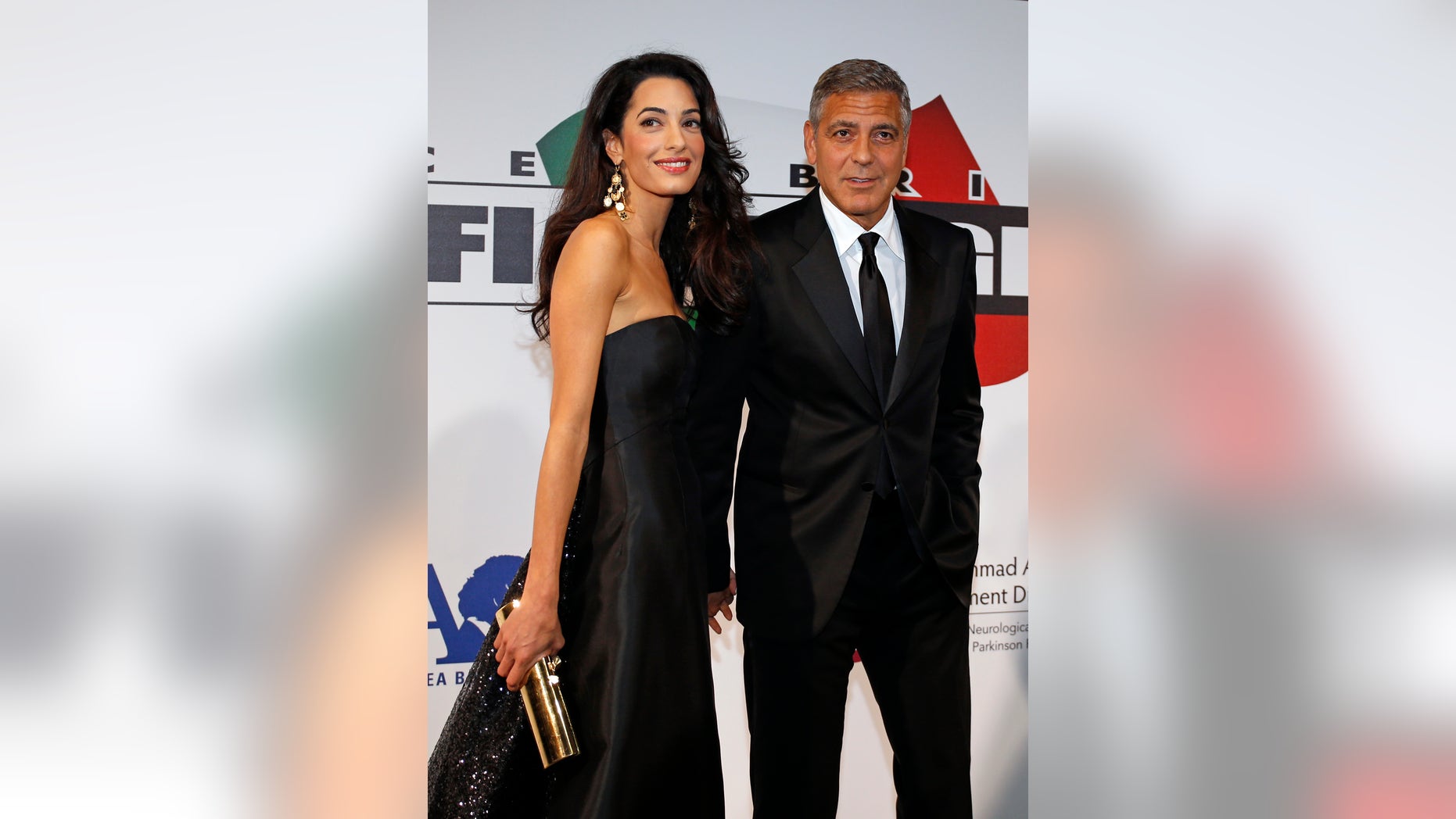 September 7, 2014. Director and actor George Clooney arrives with his fiancee barrister Amal Alamuddin to attend the Celebrity Fight Night event in Florence.