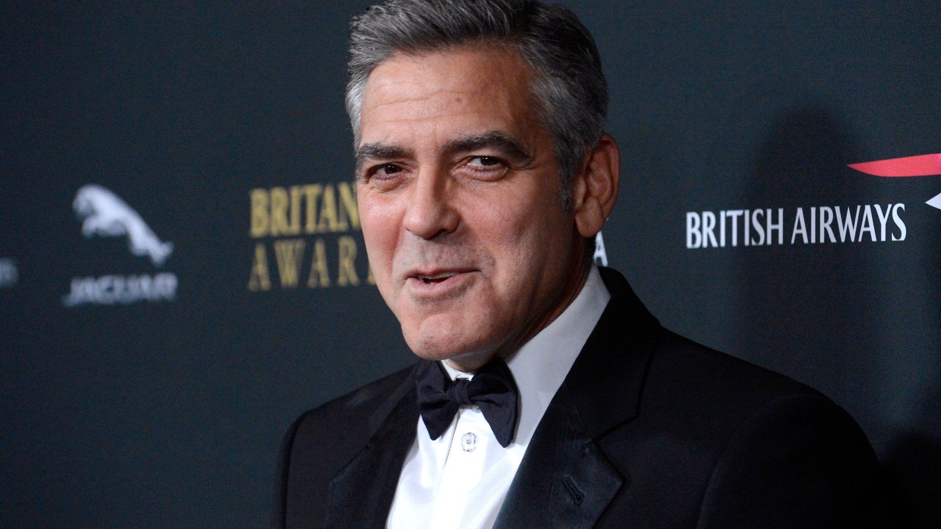 Actor George Clooney attends the BAFTA Los Angeles Britannia Awards in Beverly Hills, California November 9, 2013. REUTERS/Phil McCarten (UNITED STATES - Tags: ENTERTAINMENT) - RTX157GT