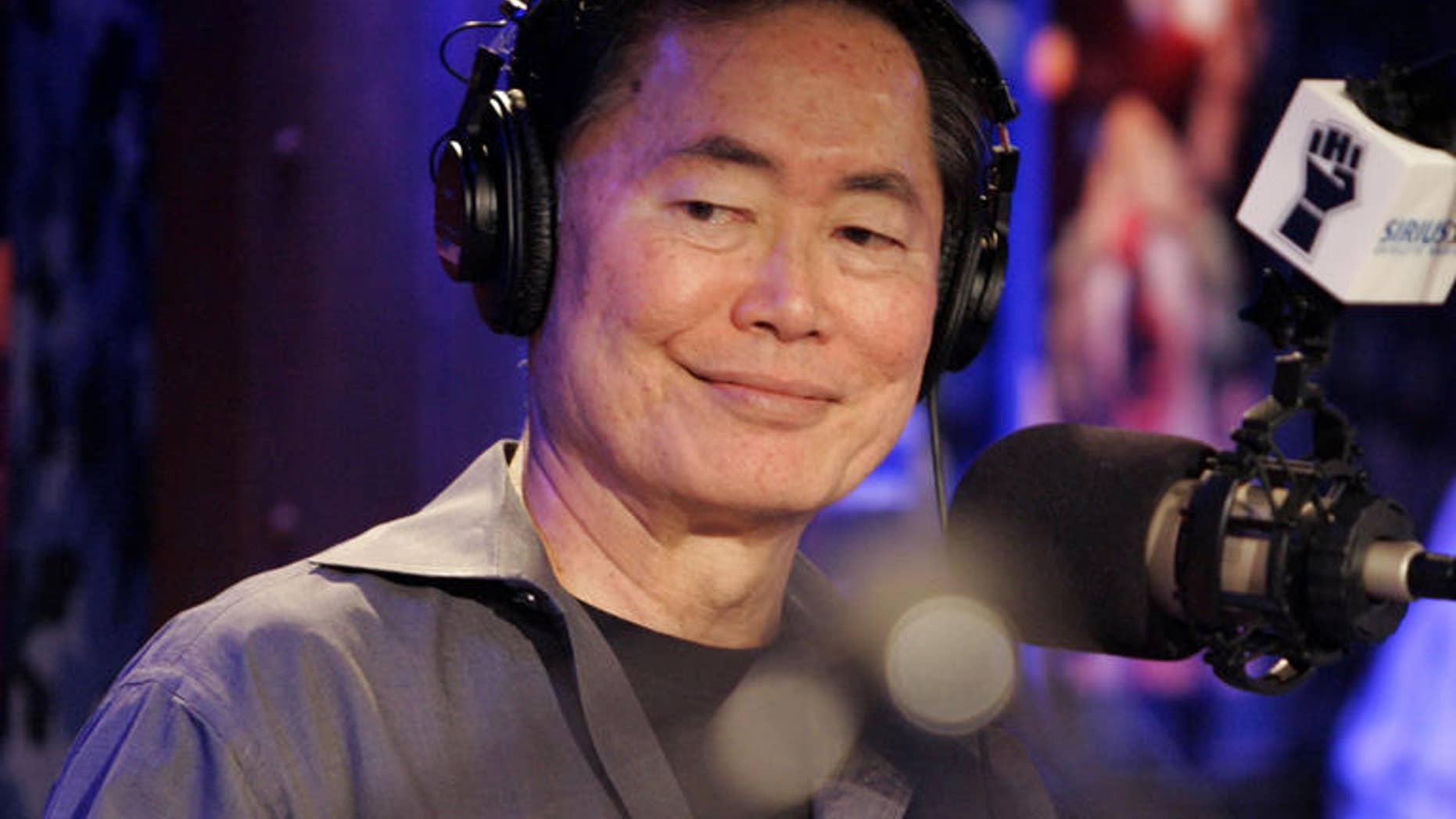 George Takei, who played Captain Sulu on the popular television show and movie series "Star Trek" and who last year publicly said he is gay, was introduced as Howard Stern's announcer during his debut show on Sirius Satellite Radio, in New York, Monday Jan. 9, 2006. .Stern's deal could be worth up to $500 million over five years to headline two Sirius channels. (AP Photo/Richard Drew)