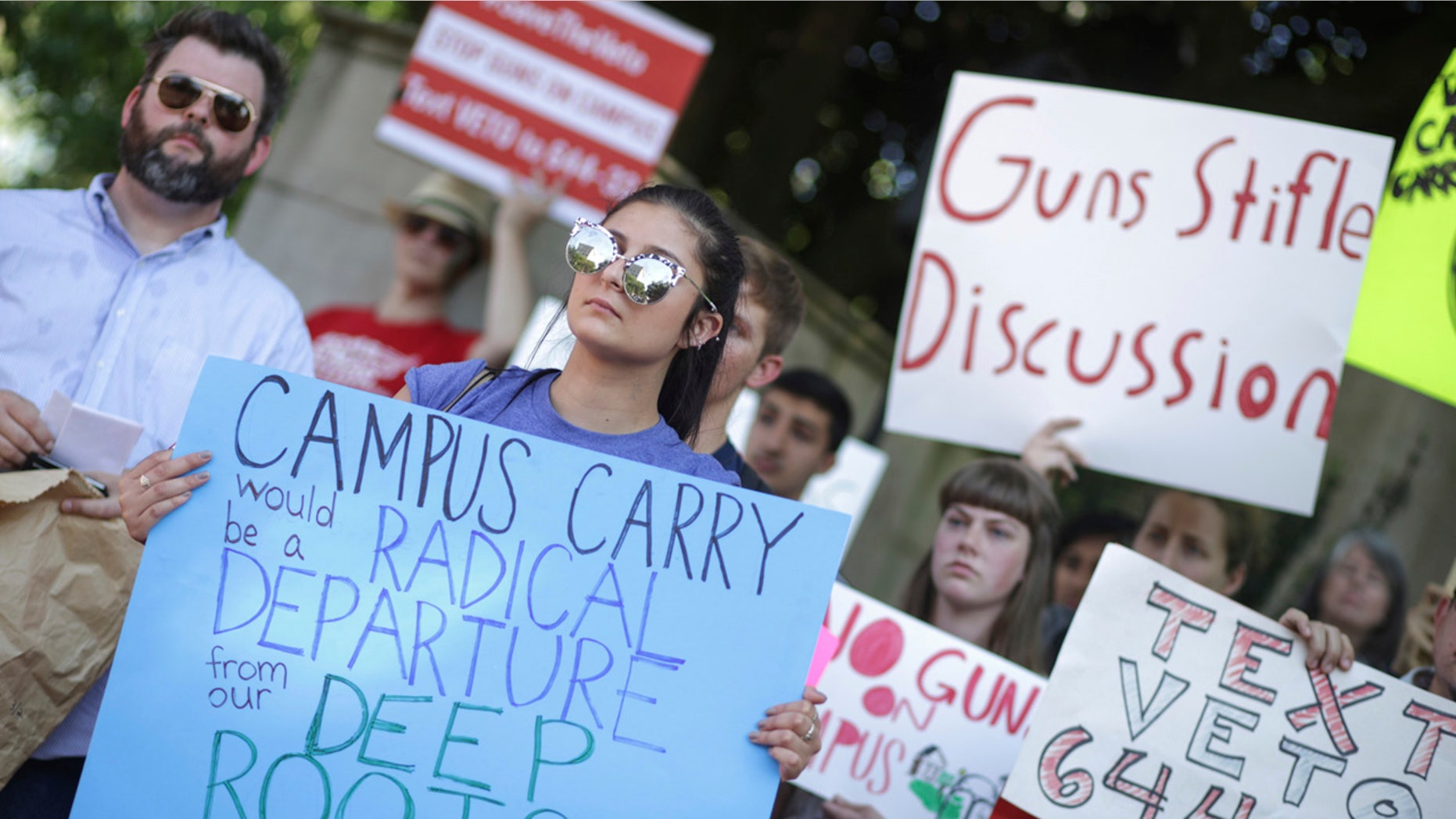 Gov. Nathan Deal signed legislation Thursday allowing people with permits to carry concealed handguns on Georgia's public college campuses, despite the objections of state university leaders and his own veto of a campus-carry measure last year.