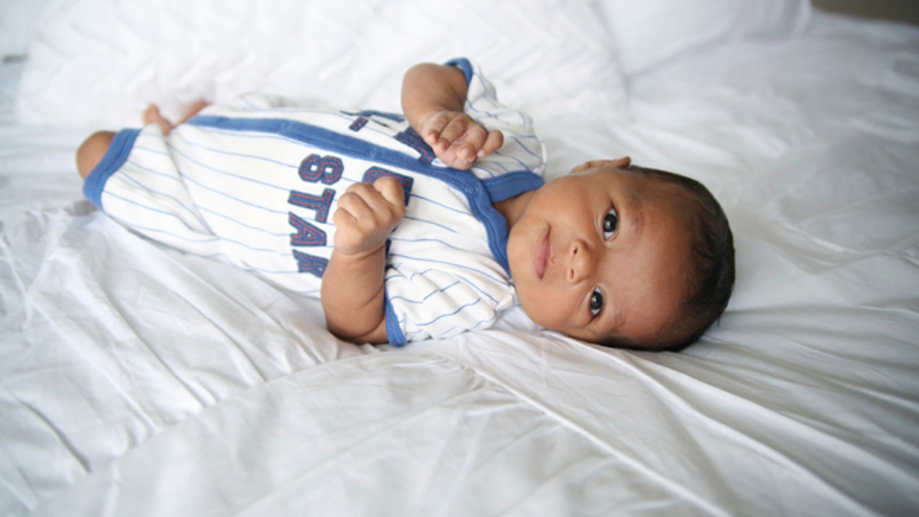 CORRECTS CITY TO LEWIS CENTER INSTEAD OF LINCOLN CENTER - This photo provided by Kristen and Devin Shines shows Riley Shines of Lewis Center, Ohio. On Thursday, Jan. 26, 2017, Gerber announced that the 7-month-old boy is the new face of Gerber baby products. (Kristen and Devin Shines via AP)