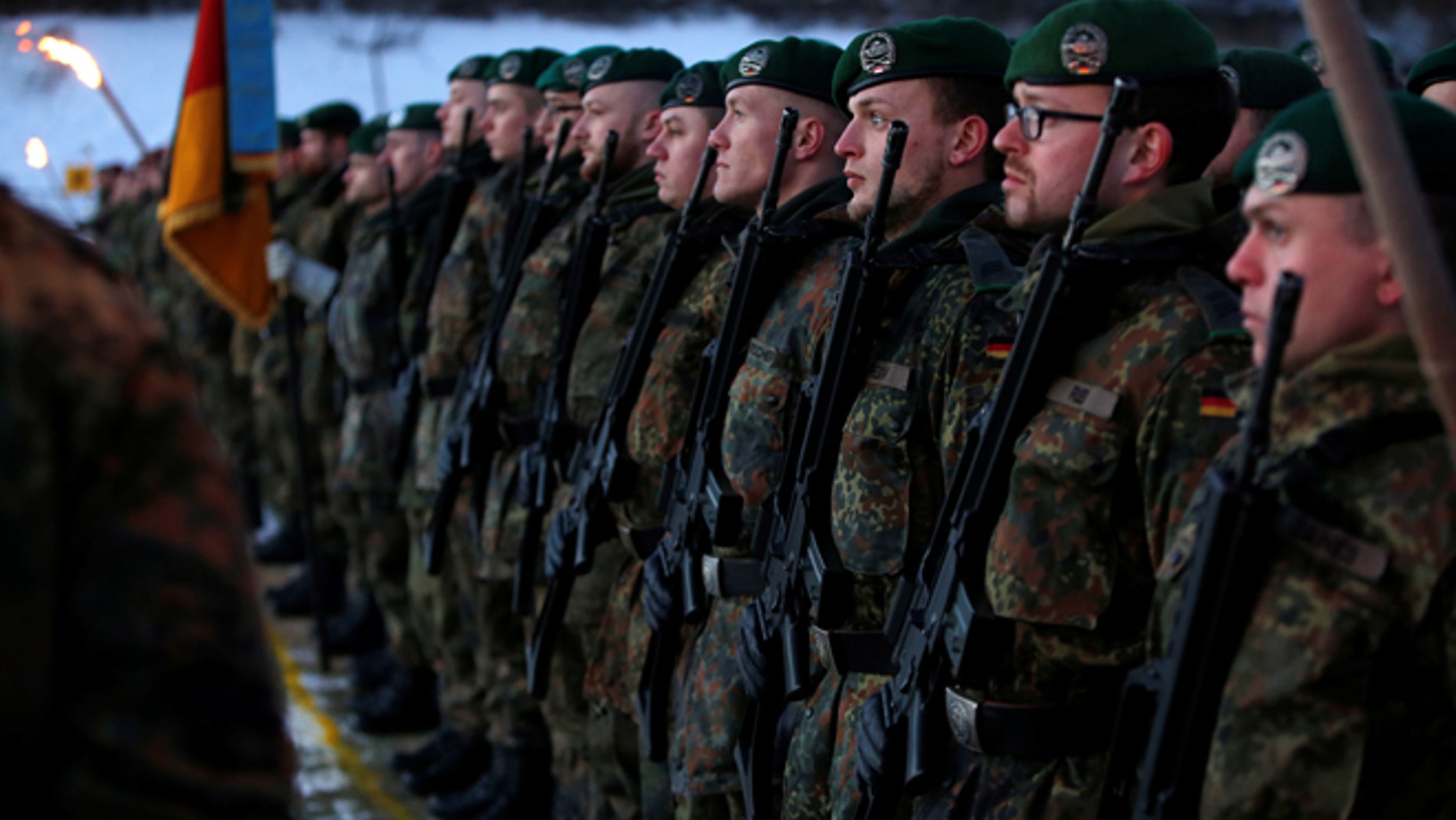 Soldiers of the German armed forces Bundeswehr take part in farewell ceremony for Panzergrenadierbataillon 122, deployment in Lithuania, in Oberviechtach, Germany January 19, 2017. REUTERS/Michaela Rehle - RTSWFXO
