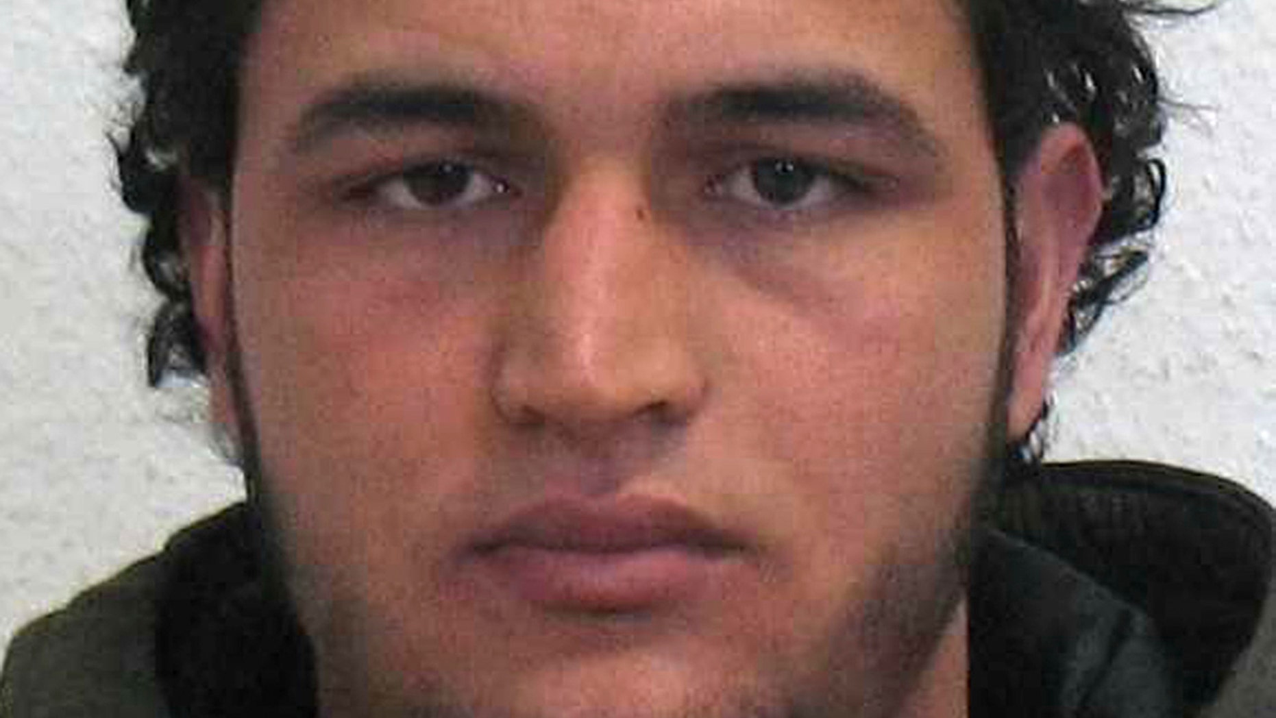 The wanted photo issued by German federal police on Wednesday, Dec. 21, 2016 shows 24-year-old Tunisian Anis Amri who is suspected of being involved in the fatal attack on the Christmas market in Berlin on Dec. 19, 2016.