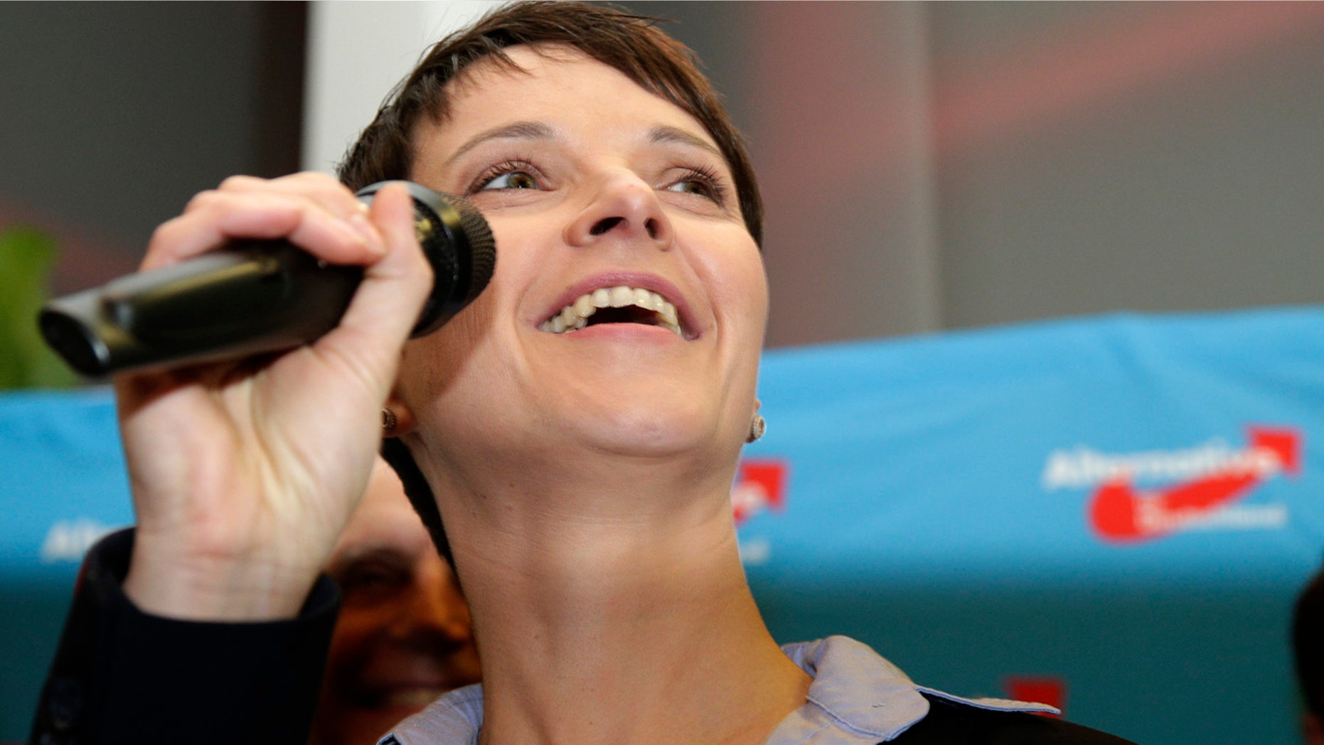 March 13, 2016: Frauke Petry, chairwoman of the right-populist AfD (Alternative for Germany) party, smiles as she speaks at a gathering after the closing of the state elections in the German federal states of Baden-Wuerttemberg, Rhineland-Palatinate and Saxony-Anhalt in Berlin. (AP Photo/Michael Sohn)
