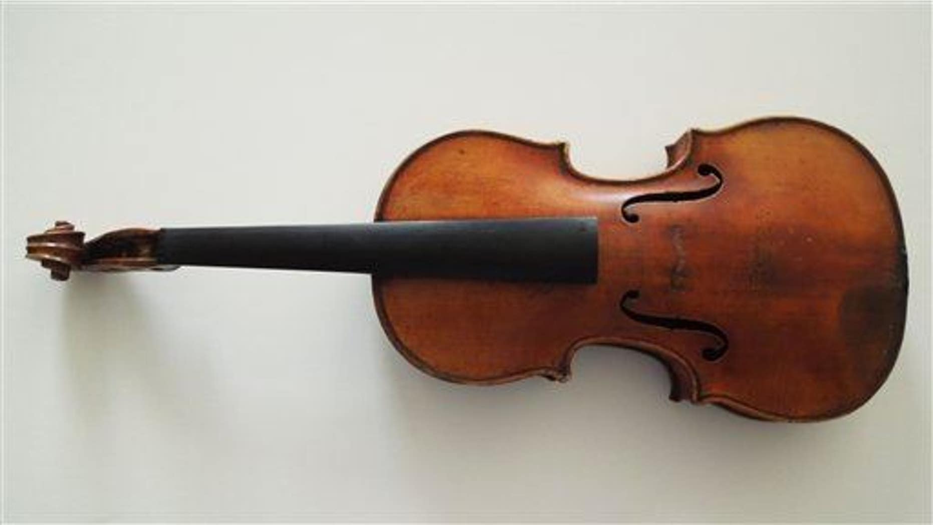 File photo of the Ames Stradivarius stolen from violinist Roman Totenberg in 1980. It was returned in 2015. (FBI via AP)