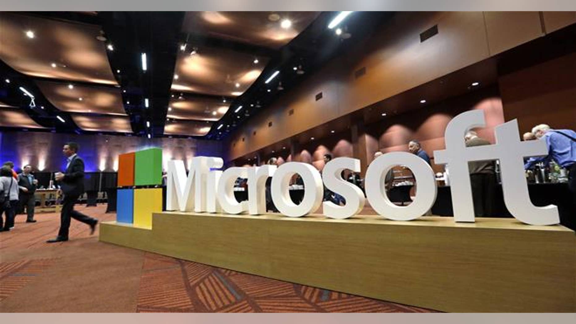 Two employees are suing Microsoft for making them watch videos of bestiality, child pornography, and murder as part of their jobs. (AP Photo/Elaine Thompson)