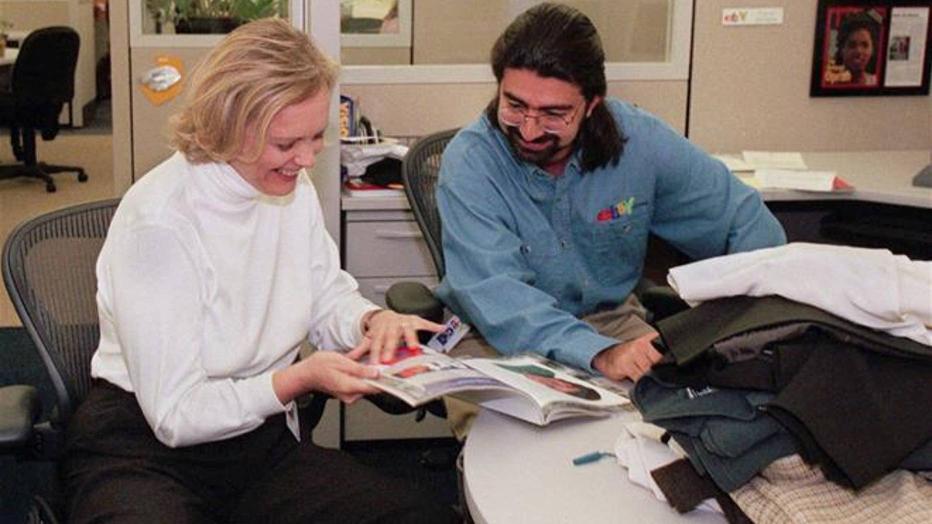 A 1999 file photo of eBay CEO Meg Whitman and founder Pierre Omidyar. (AP Photo/Randi Lynn Beach, File)