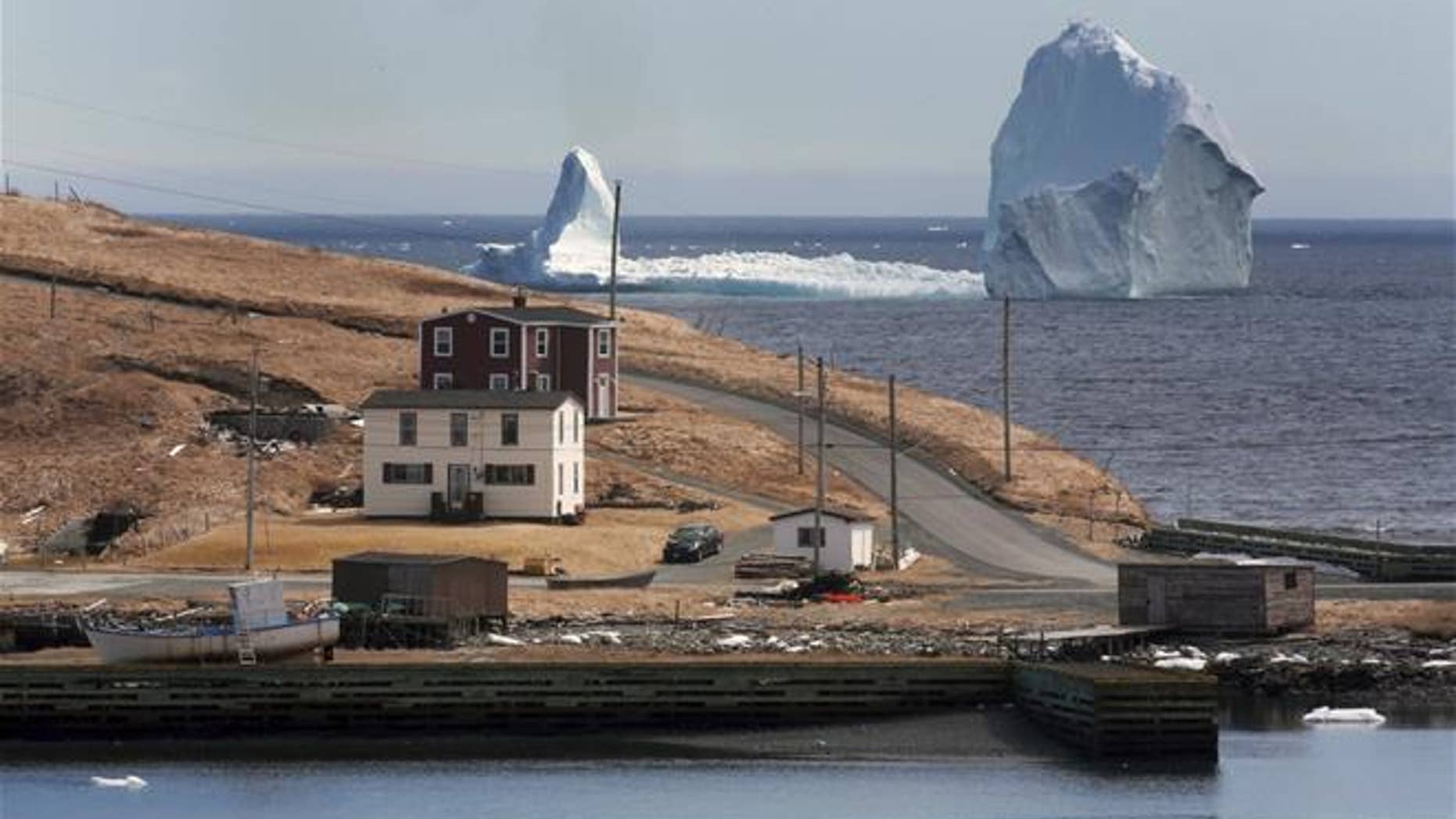 A large iceberg is visible from the shore in Ferryland, an hour south of St. John's, Newfoundland on Monday, April 10, 2017.
