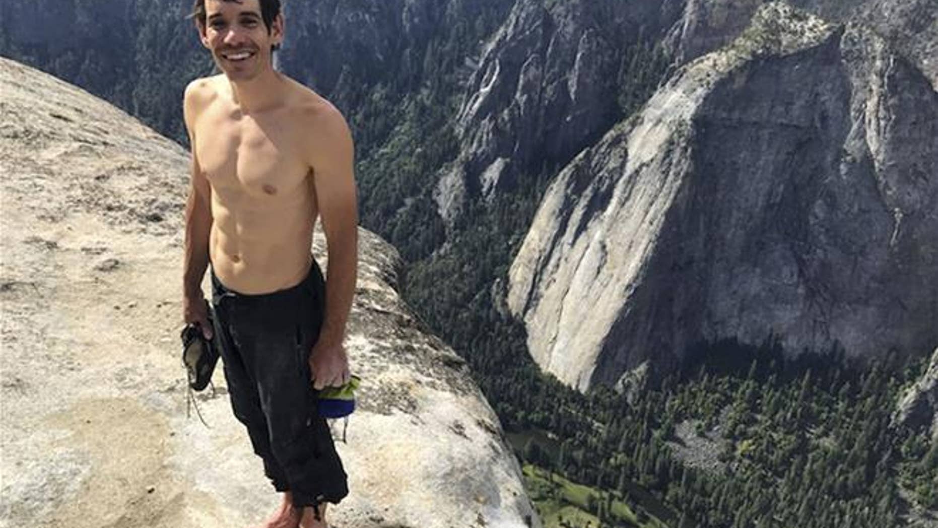 This June 3 photo provided by National Geographic shows Alex Honnold atop El Capitan in Yosemite National Park.