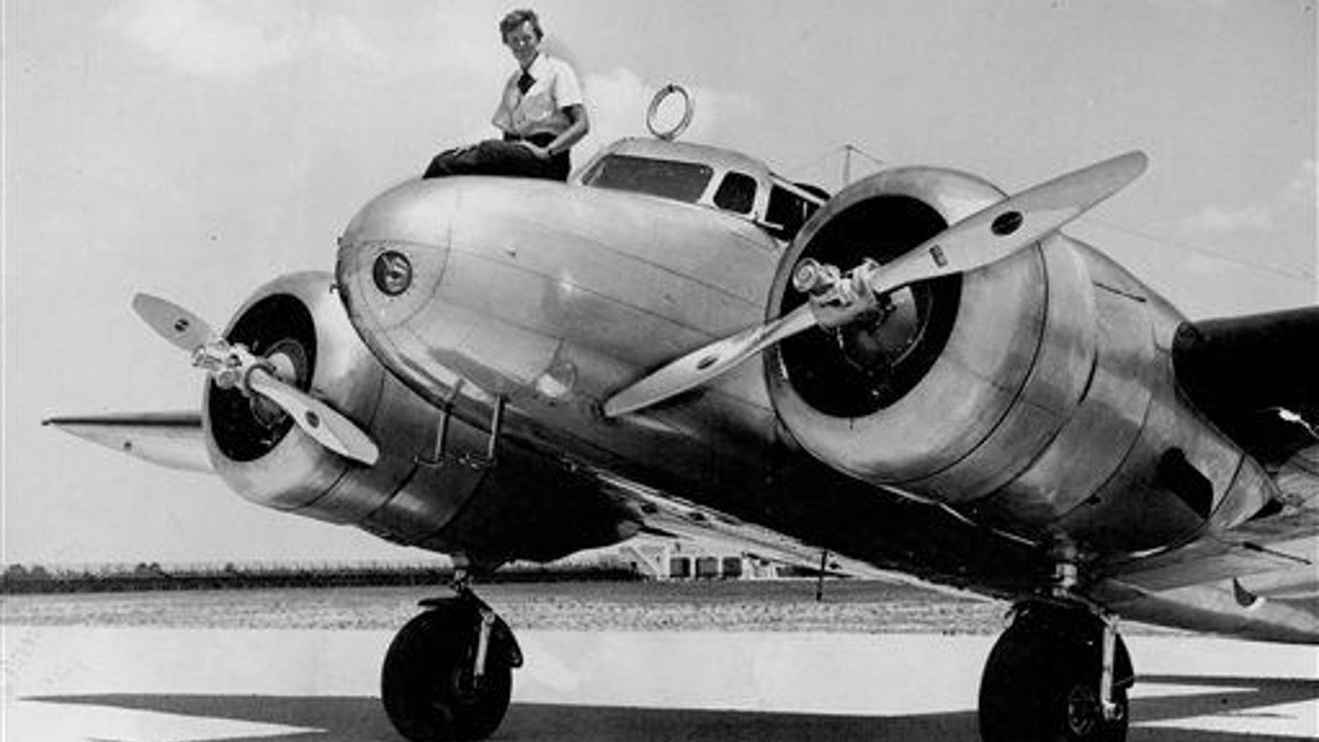 This 1937 photo shows Amelia Earhart before takeoff in Miami for an attempted round-the-world flight.